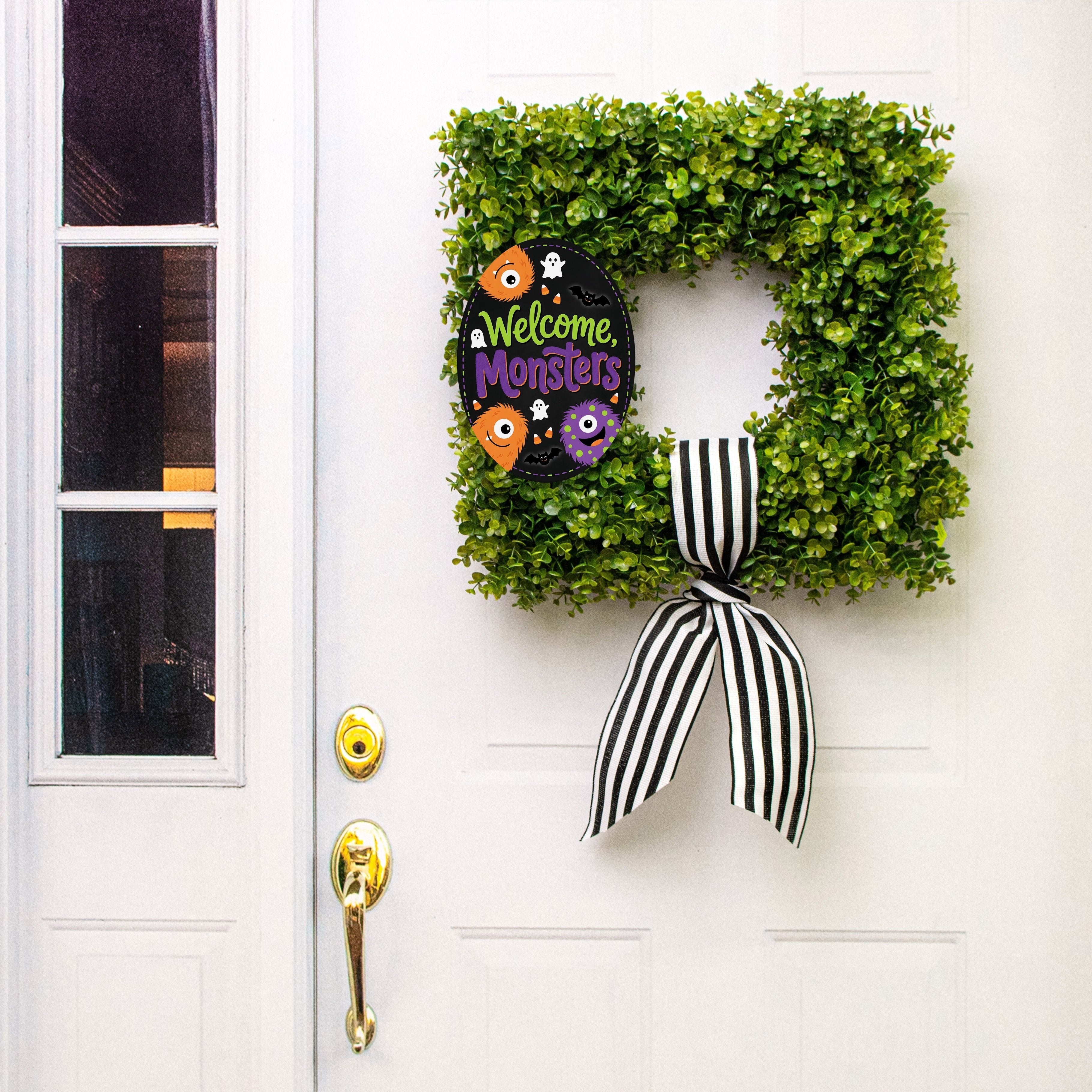 10.5" Oval Waterproof Sign: Halloween Welcome Monsters Lifestyle Photo
