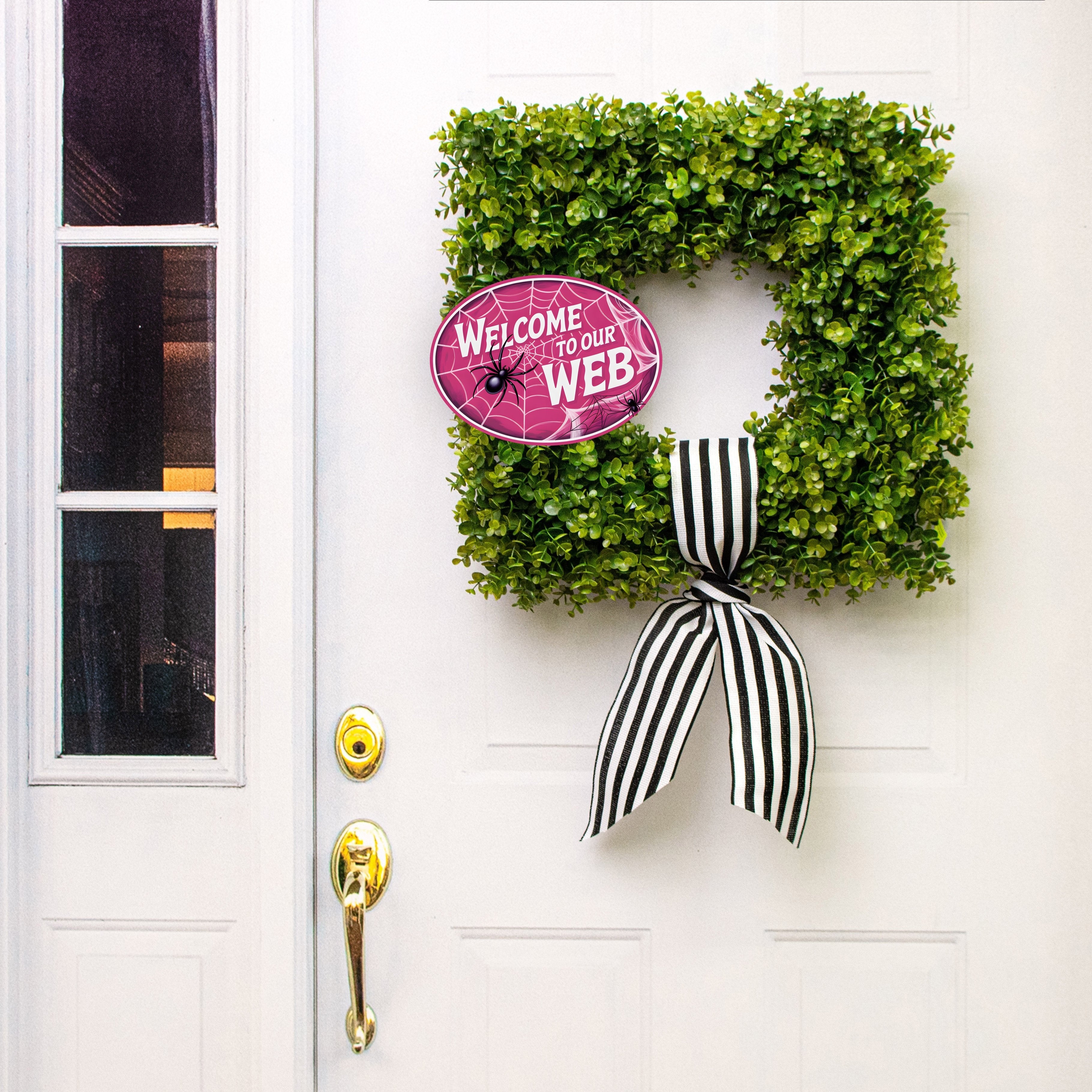 10.5" Oval Waterproof Sign: Pink Halloween Welcome Spider Web Lifestyle Photo
