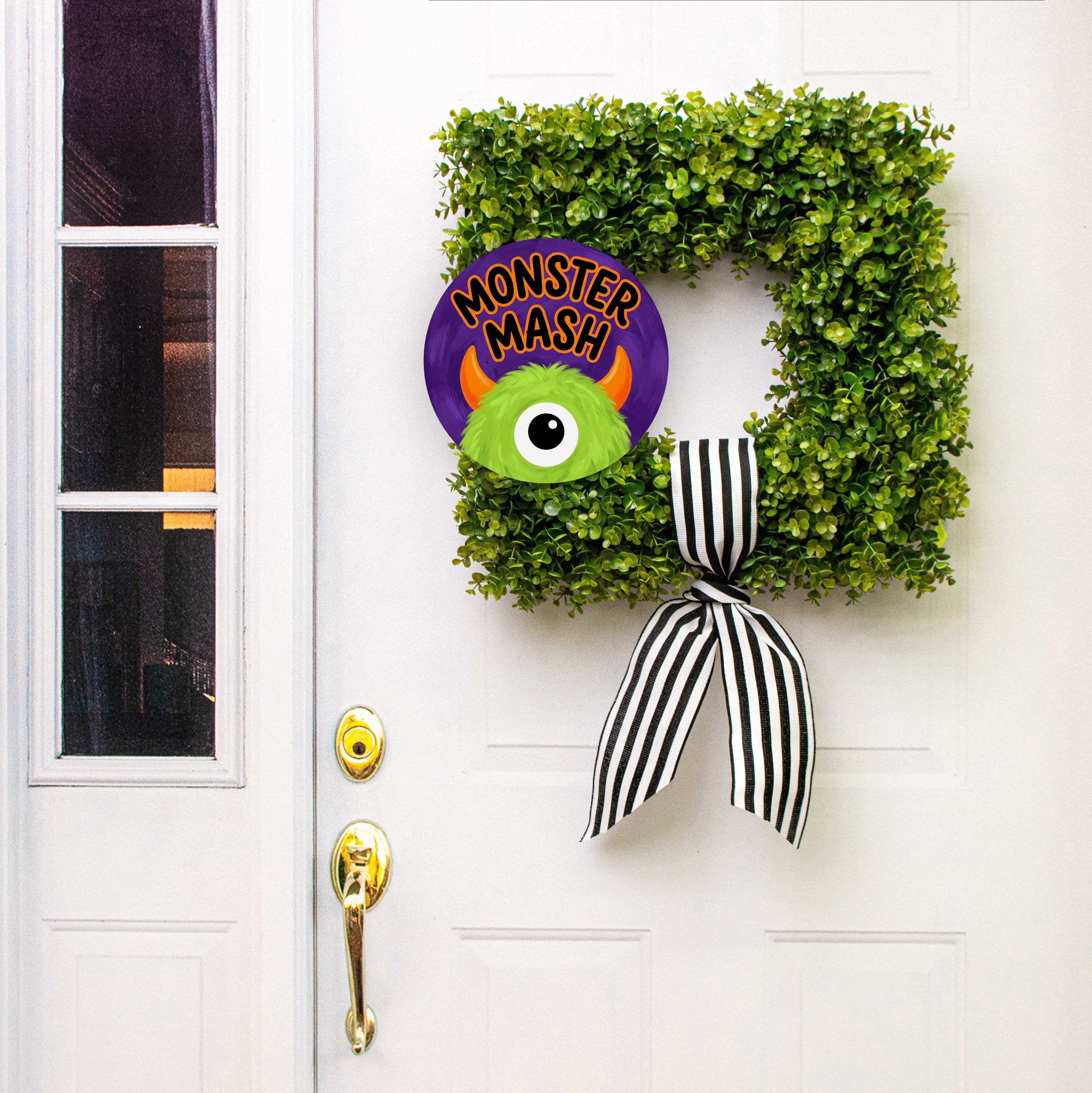 10.5" Round Waterproof Sign: Monster Mash One-Eyed Green Monster Lifestyle Photo