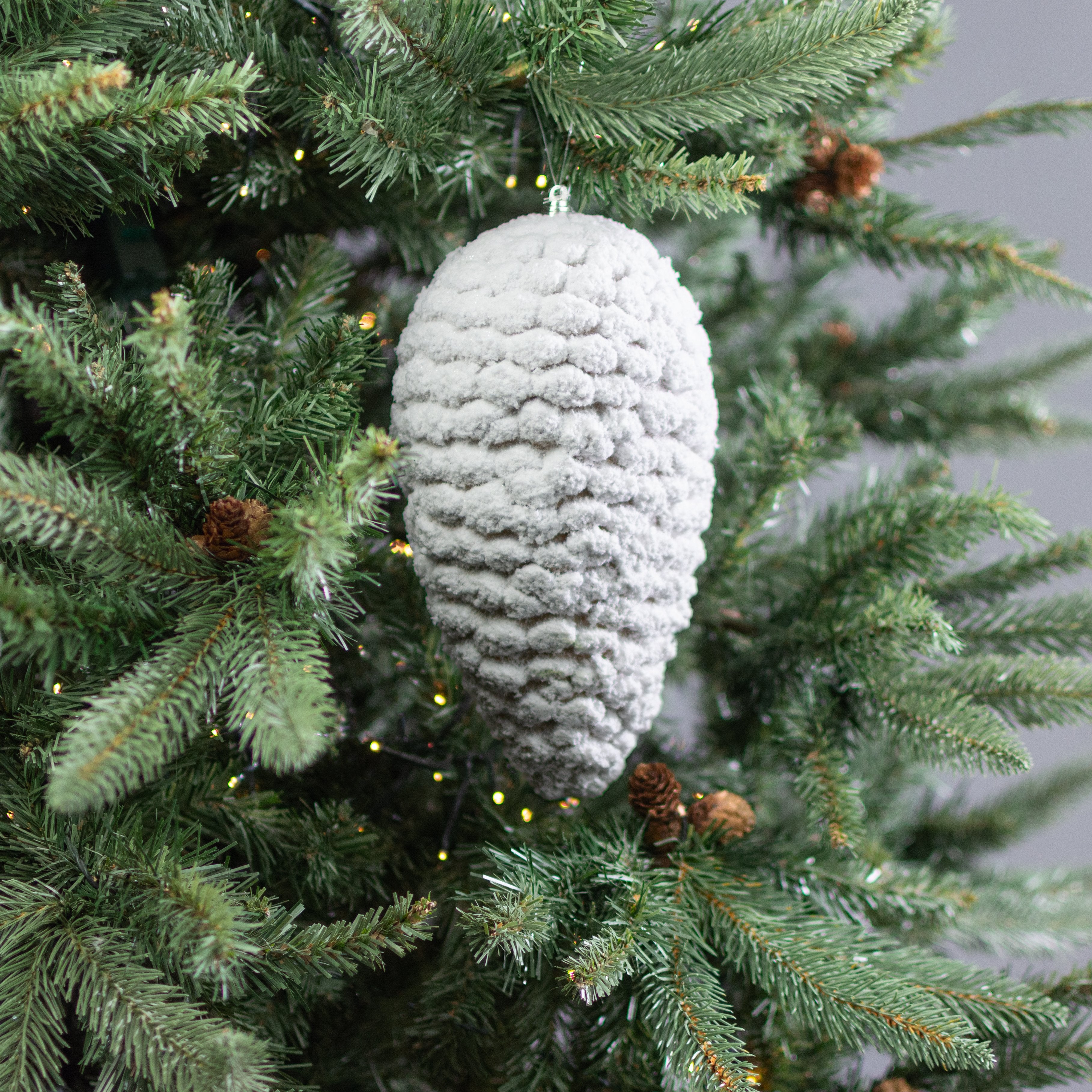 10" Flocked Pinecone Ornament: Snow Lifestyle Photo