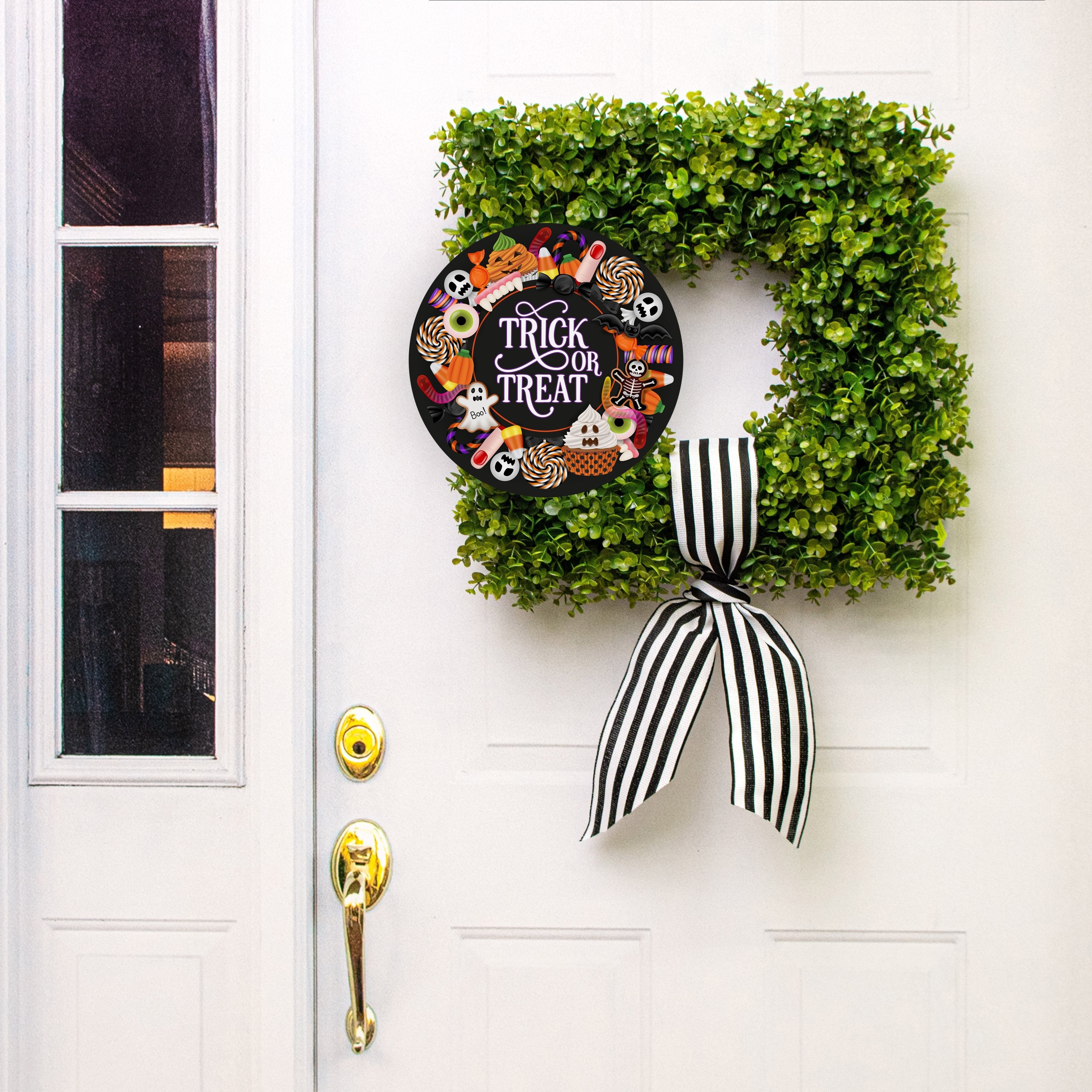 11.75" Round Waterproof Sign: Trick or Treat Candy Lifestyle Photo