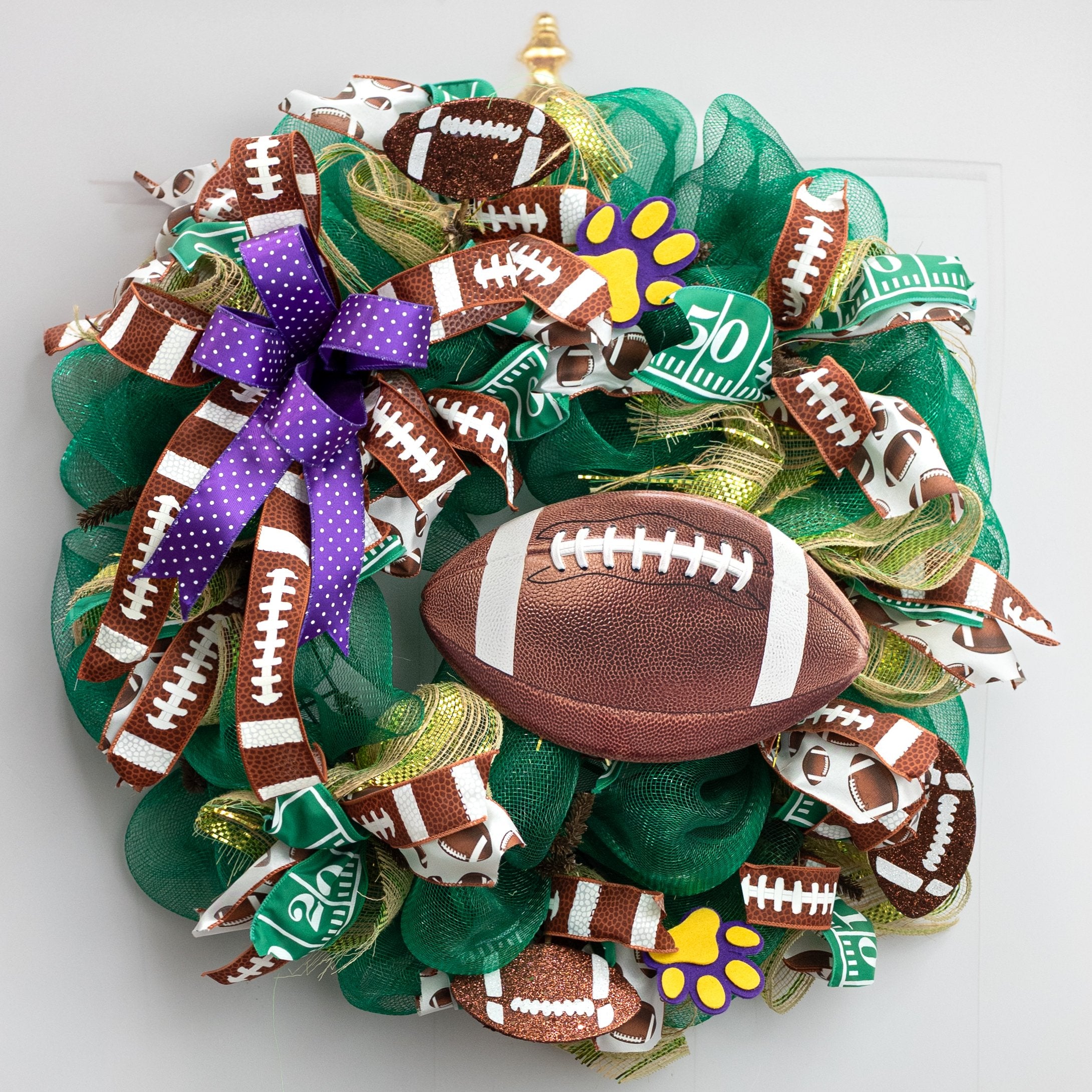 11" Embossed Metal Football Sign: Brown Lifestyle Photo