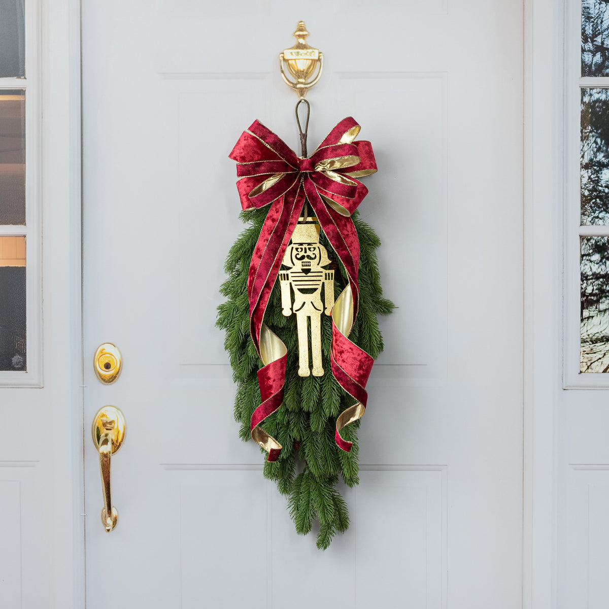 12.5" Metal Nutcracker Ornament: Metallic Gold Lifestyle Photo