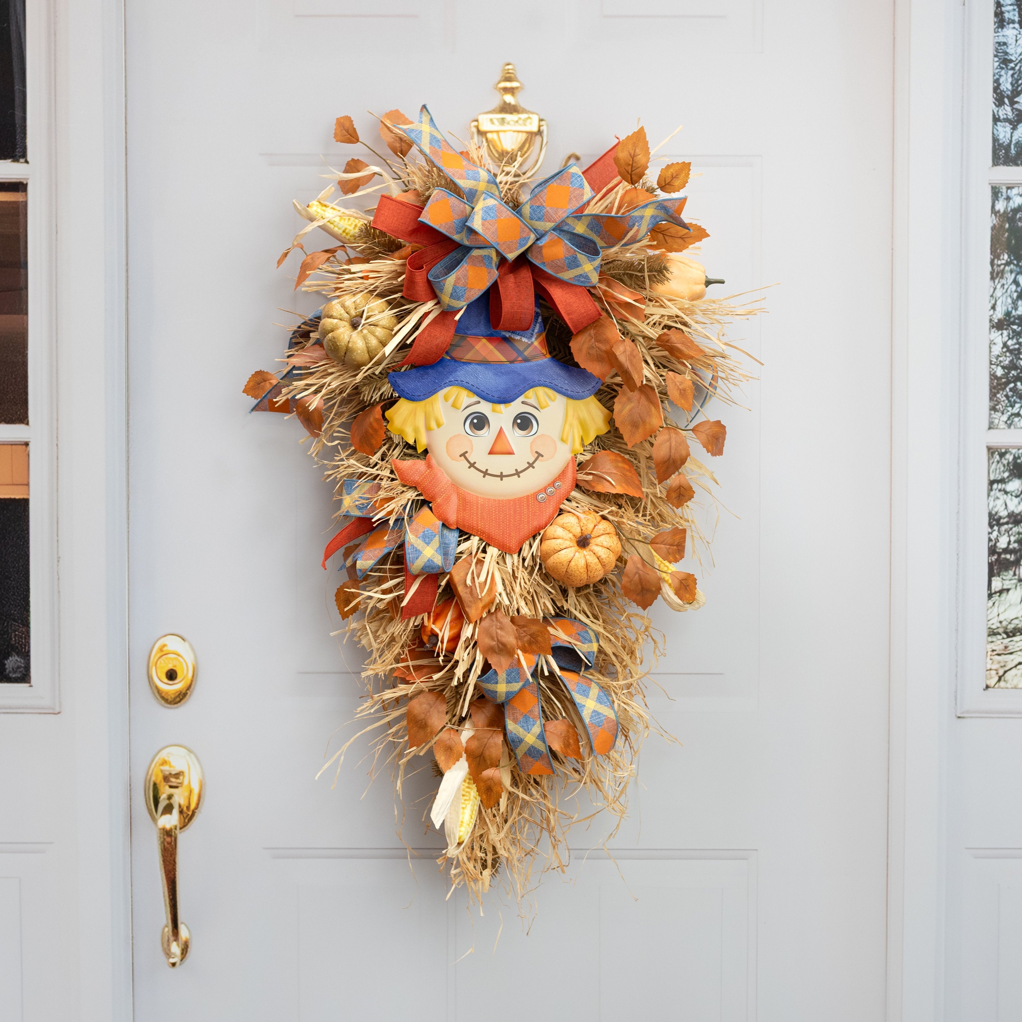 12" Embossed Metal Scarecrow Decoration: Blue Hat Lifestyle Photo
