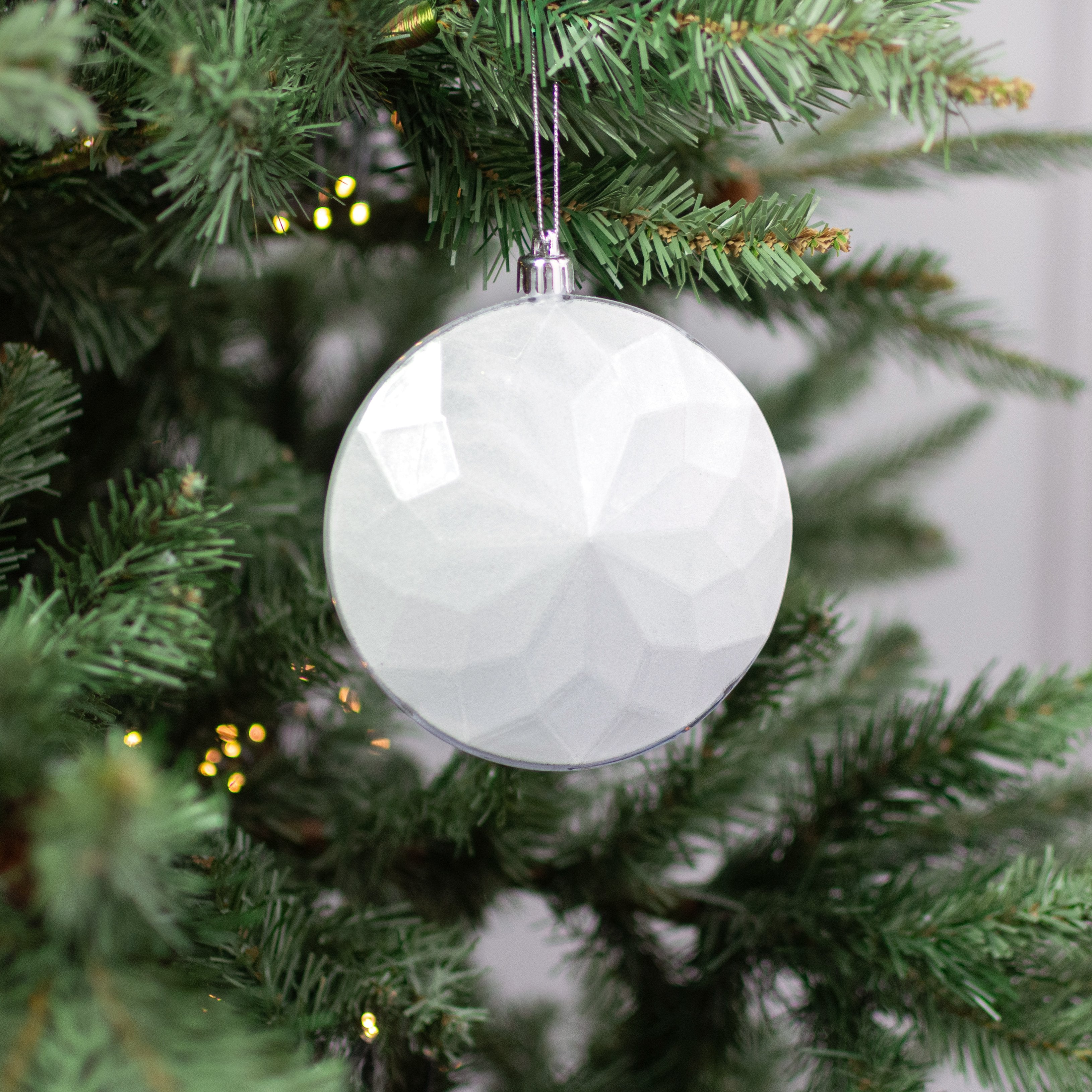 120mm Faceted Flat Round Gem Ornament: Glitter Inside White Lifestyle Photo