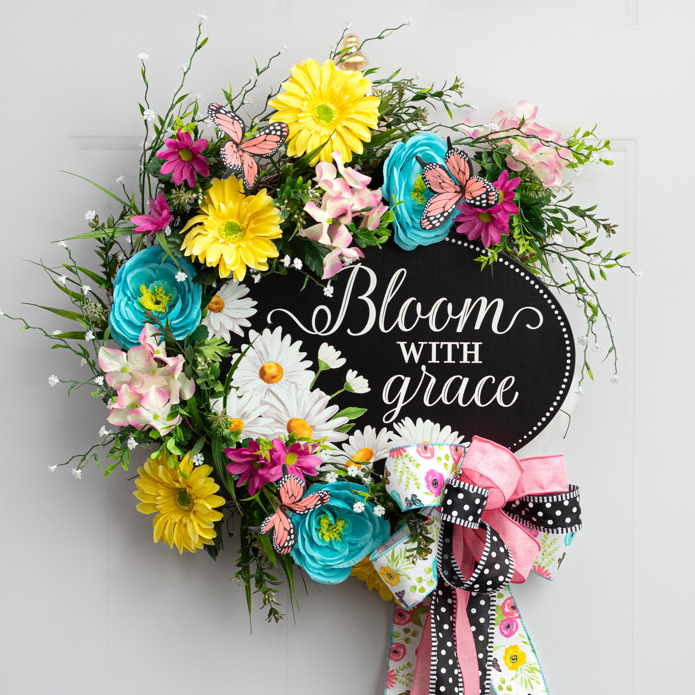 15" Oval Metal Sign: Bloom With Grace Daisies Lifestyle Photo