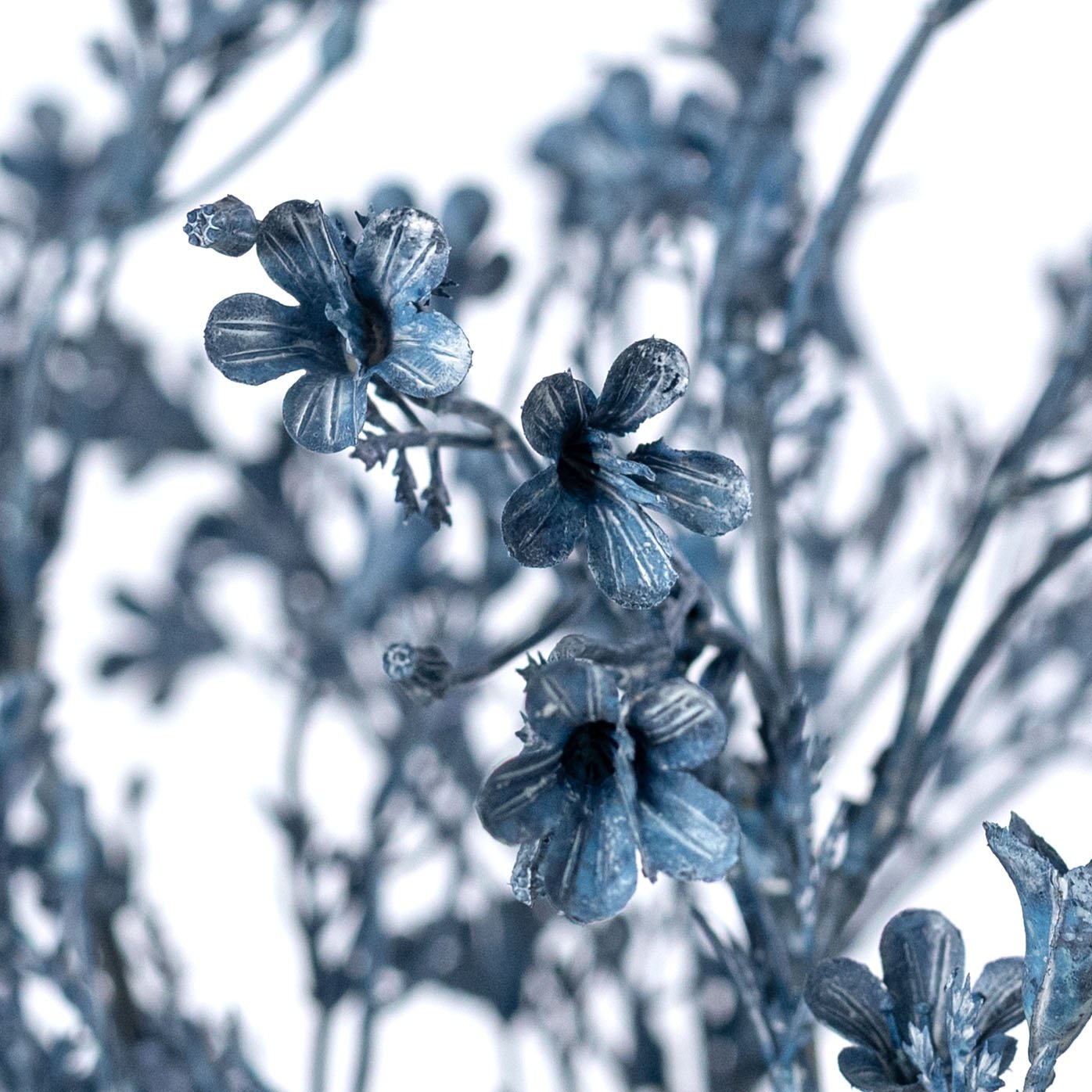 18" Plastic Wax Flower Bush: Smoke Blue (7 Stem) Lifestyle Photo