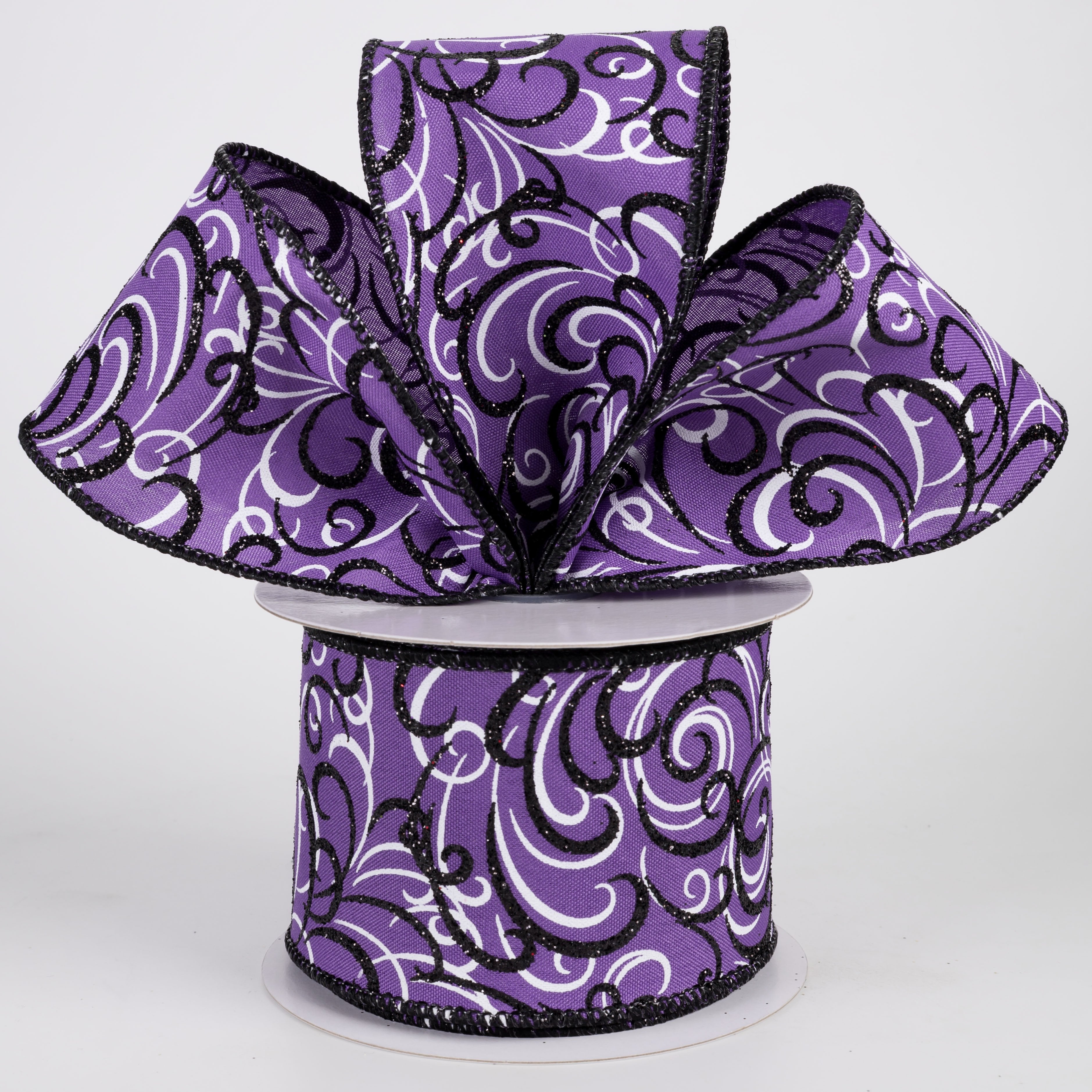 2.5" Glittered Multi Swirls Ribbon: Black & White on Purple (10 Yards) Lifestyle Photo