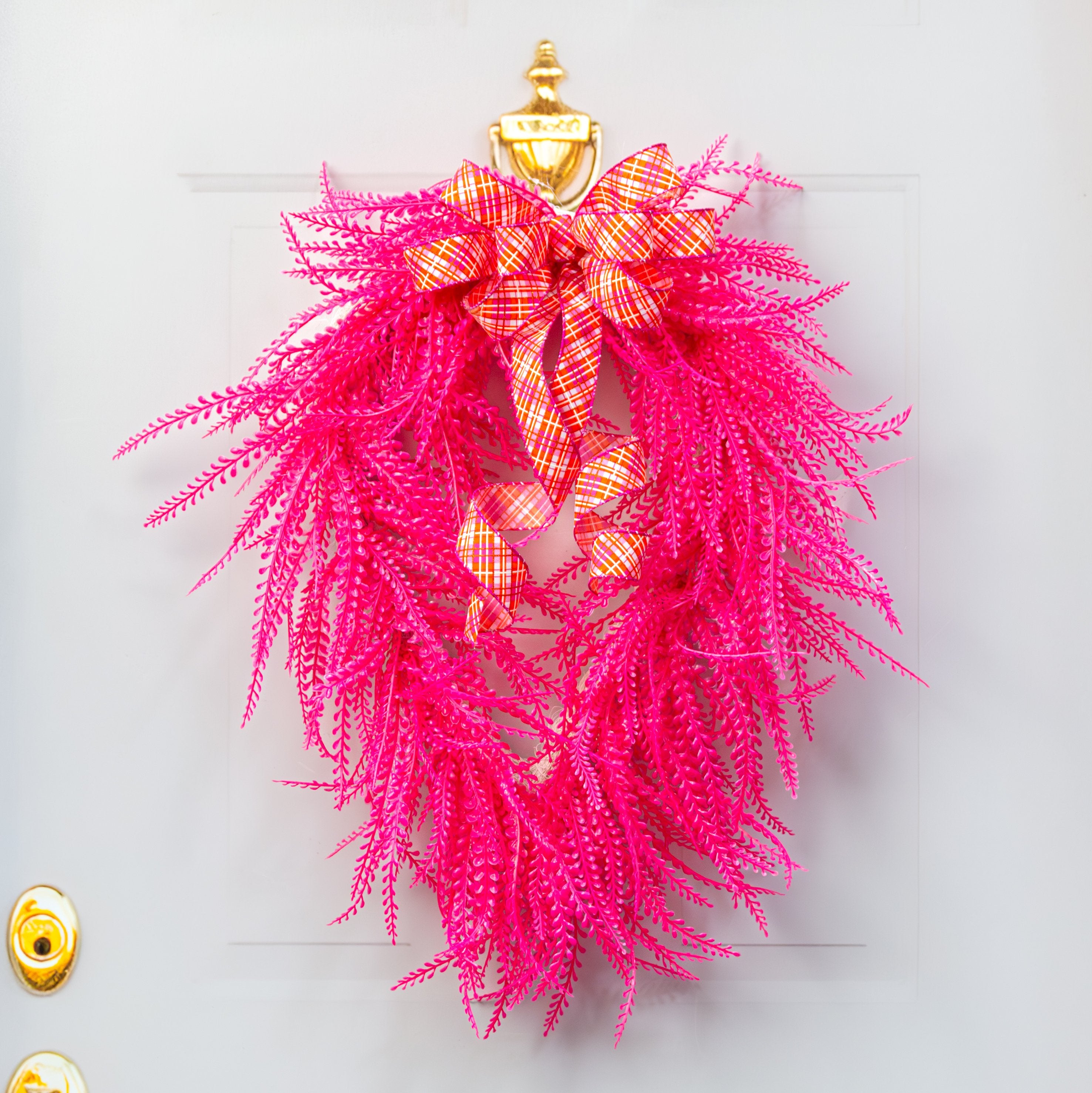 26" x 17" Draping Button Fern Wreath: Neon Hot Pink Lifestyle Photo