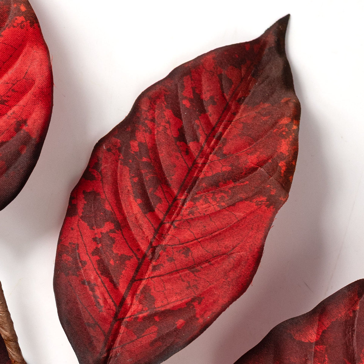26" Fall Magnolia Leaves Spray: Brick Lifestyle Photo