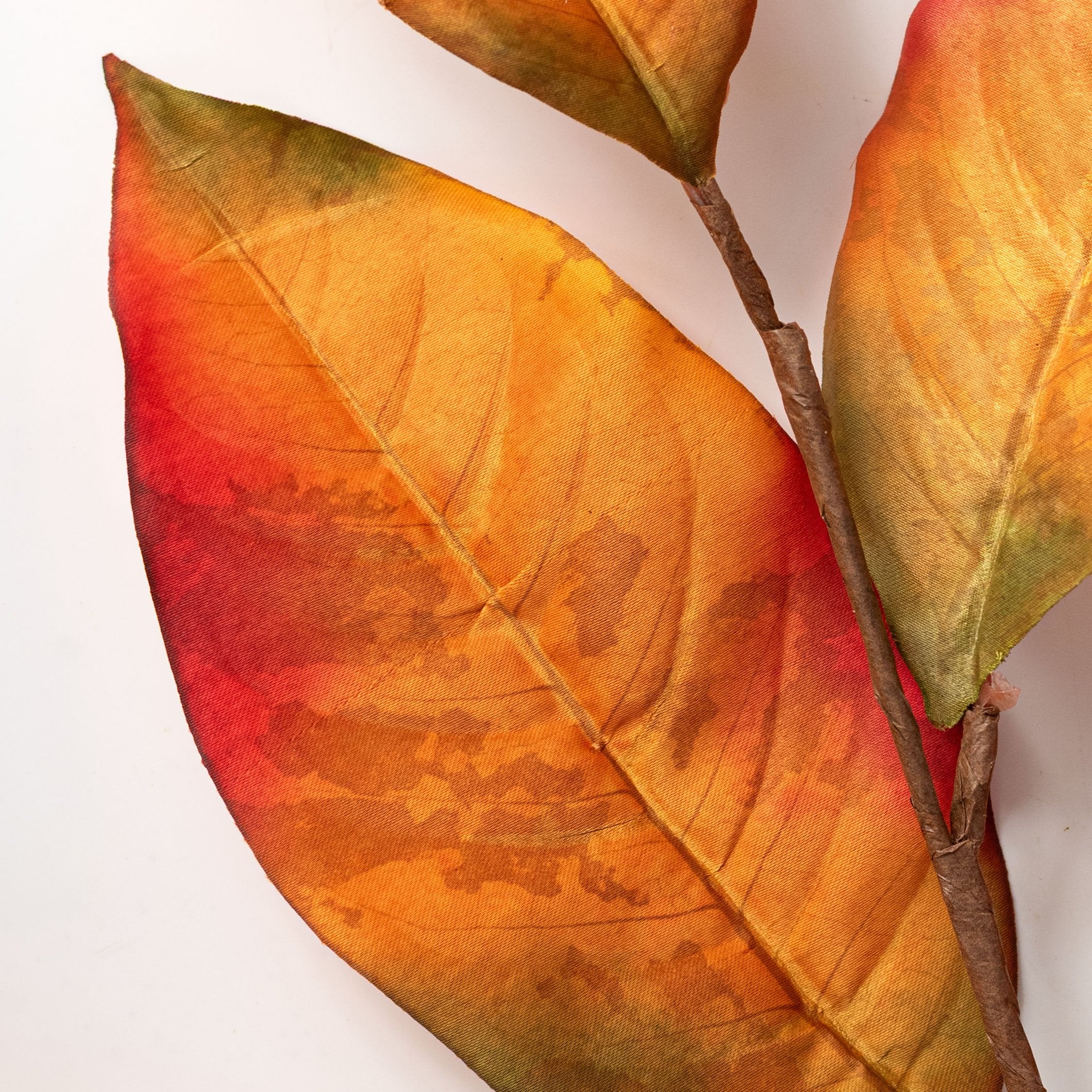 26" Fall Magnolia Leaves Spray: Orange Lifestyle Photo