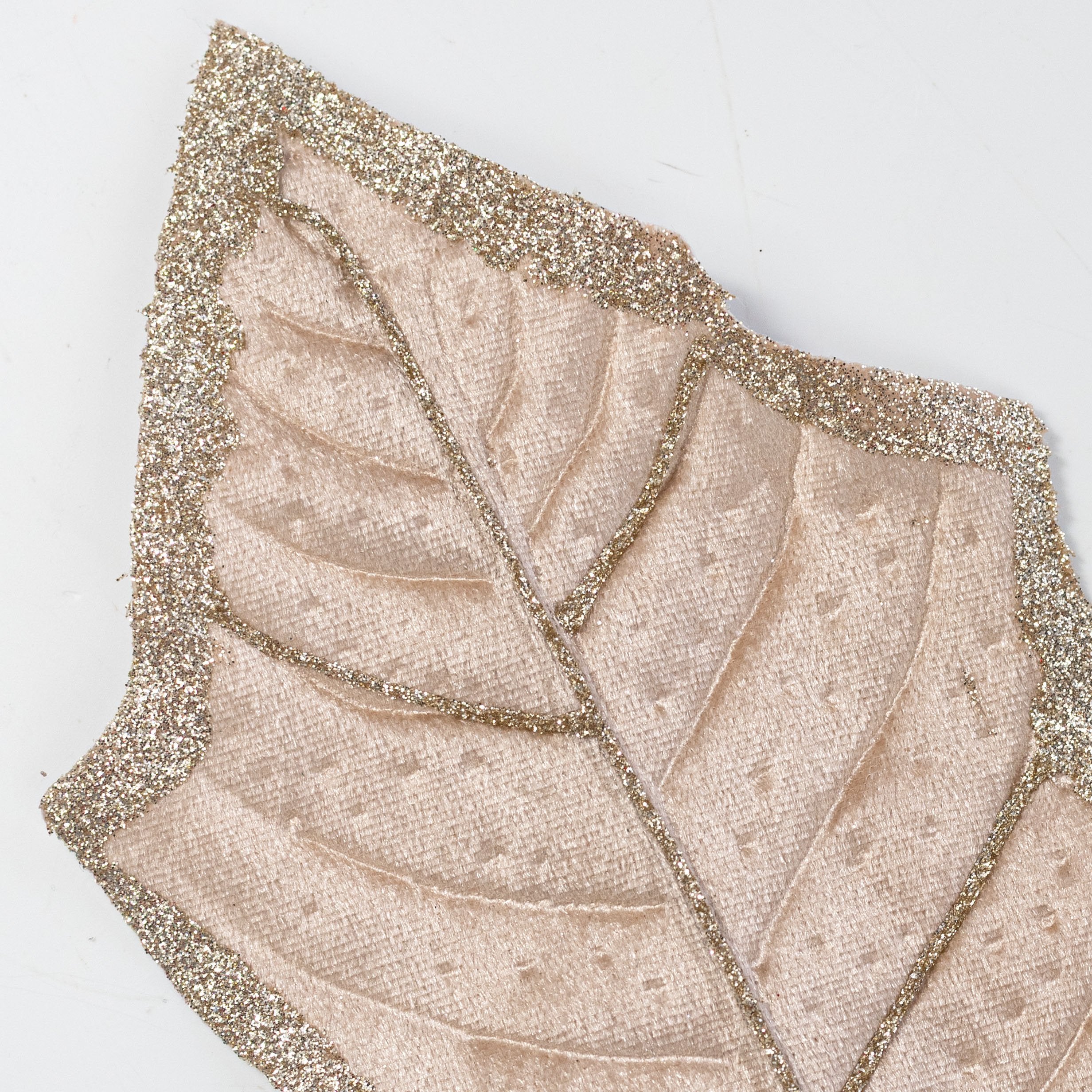 27" Oversized Velvet Holly Leaves Spray: Champagne Gold Lifestyle Photo