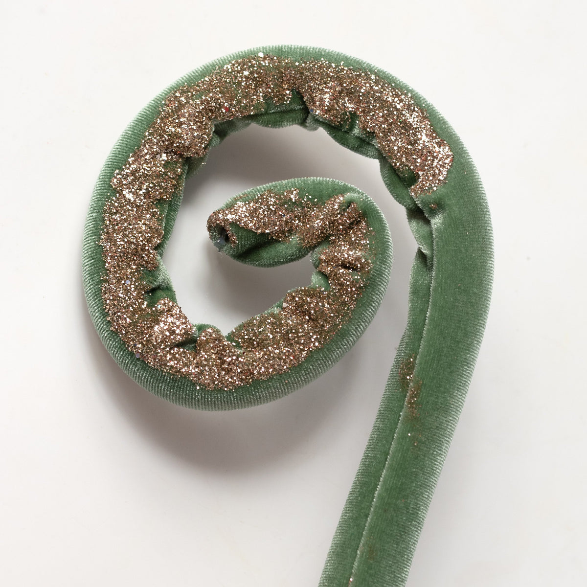 28" Glittered Velvet Spiral Curly Spray: Sage Green & Gold Lifestyle Photo