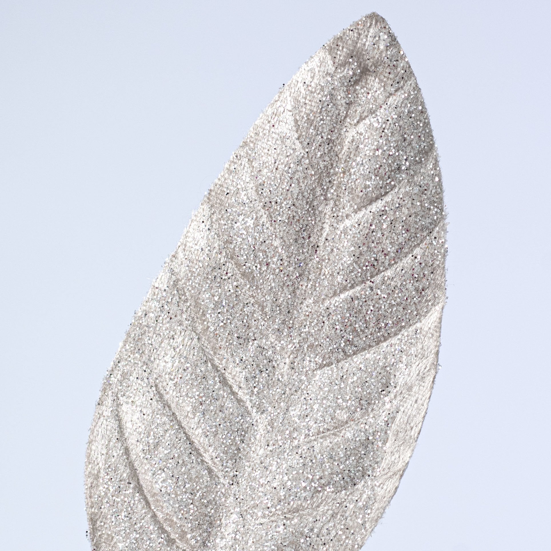 28" Sparkle Magnolia Leaves Spray: Platinum Lifestyle Photo