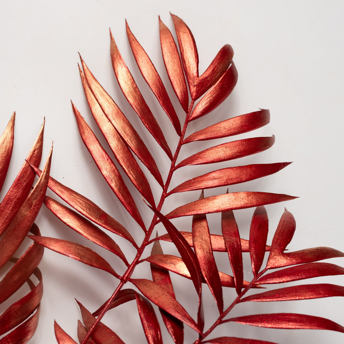 30" Plastic Metallic Palm Fern Spray: Red Lifestyle Photo