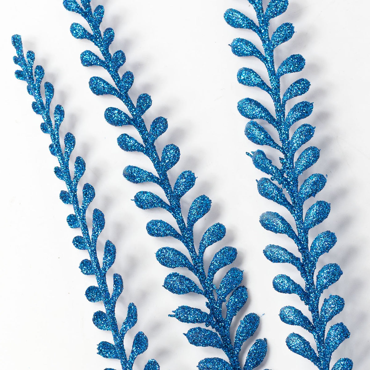 33" Plastic Glitter Button Fern Leaves Spray: Royal Blue Lifestyle Photo