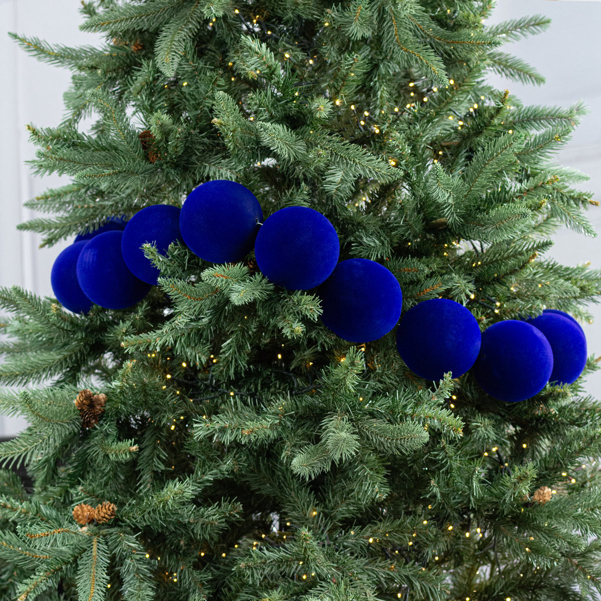 72" Flocked Ball Garland: 100mm Navy Blue (18 Balls) Lifestyle Photo