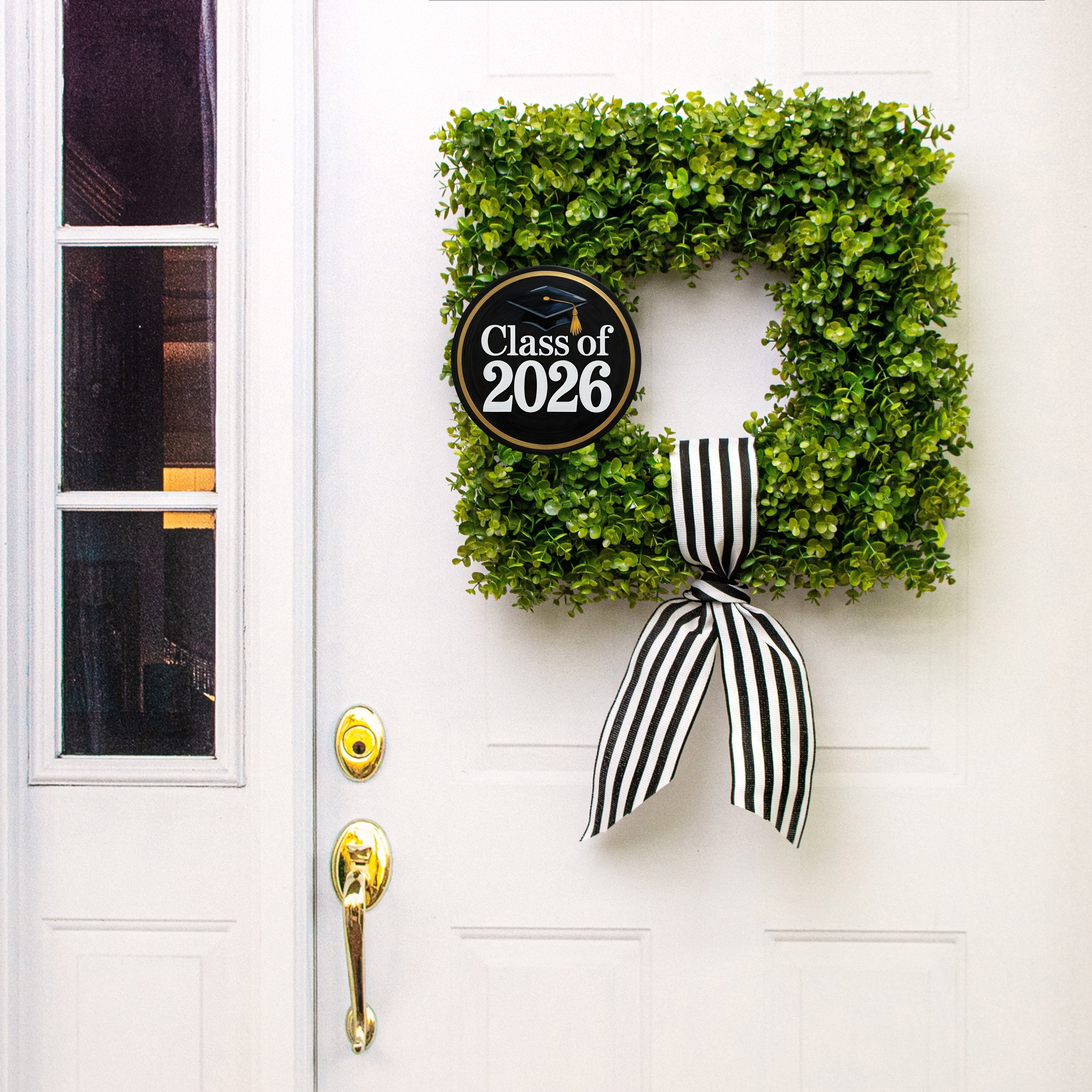 8.5" Round Waterproof Sign: Black & Gold Graduation 2026 Lifestyle Photo