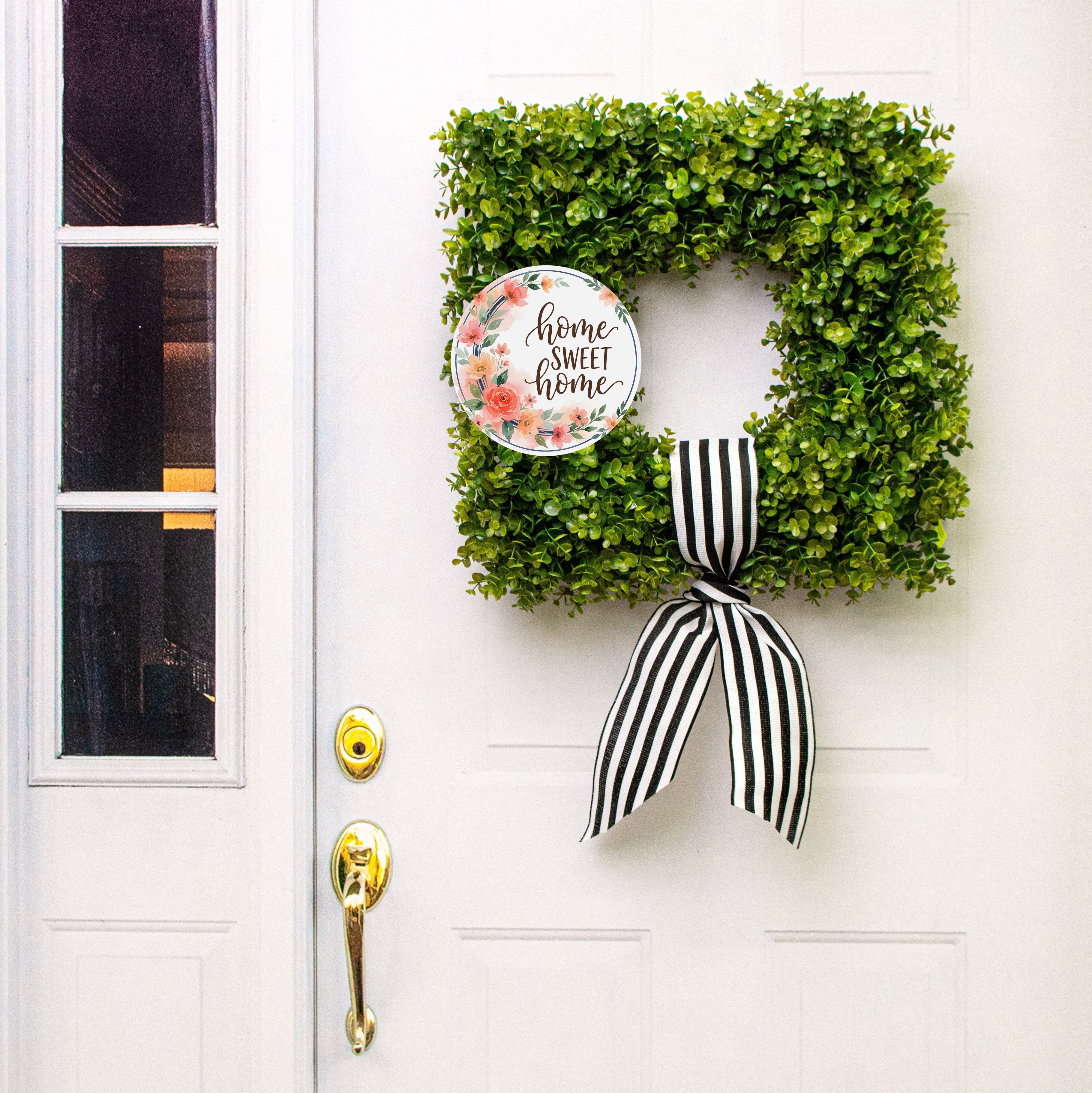 8.5" Round Waterproof Sign: Home Sweet Home Floral Wreath Lifestyle Photo