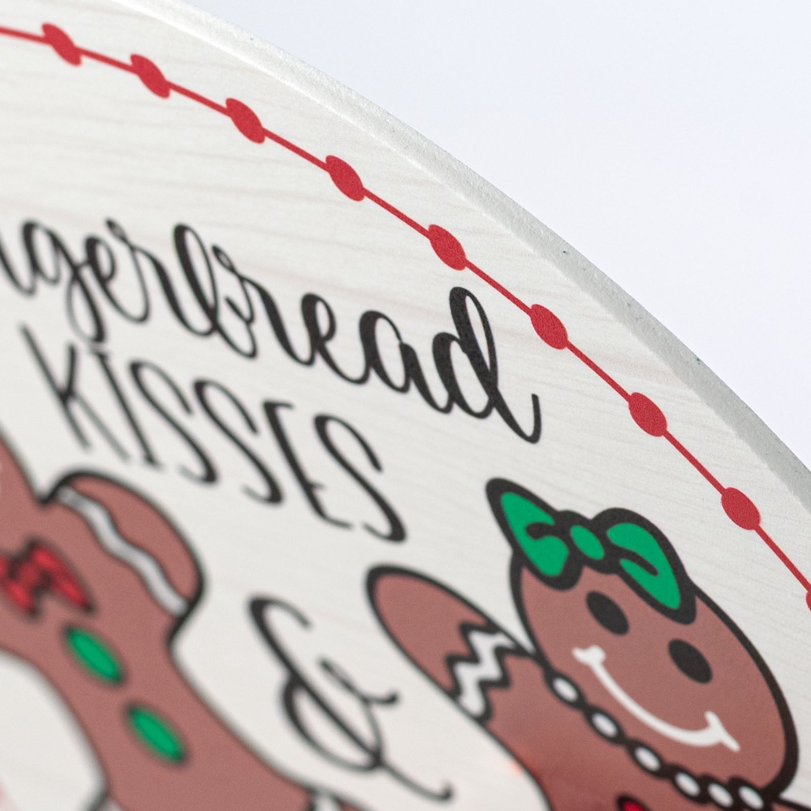 8.5" Round Waterproof Sign: Gingerbread Kisses