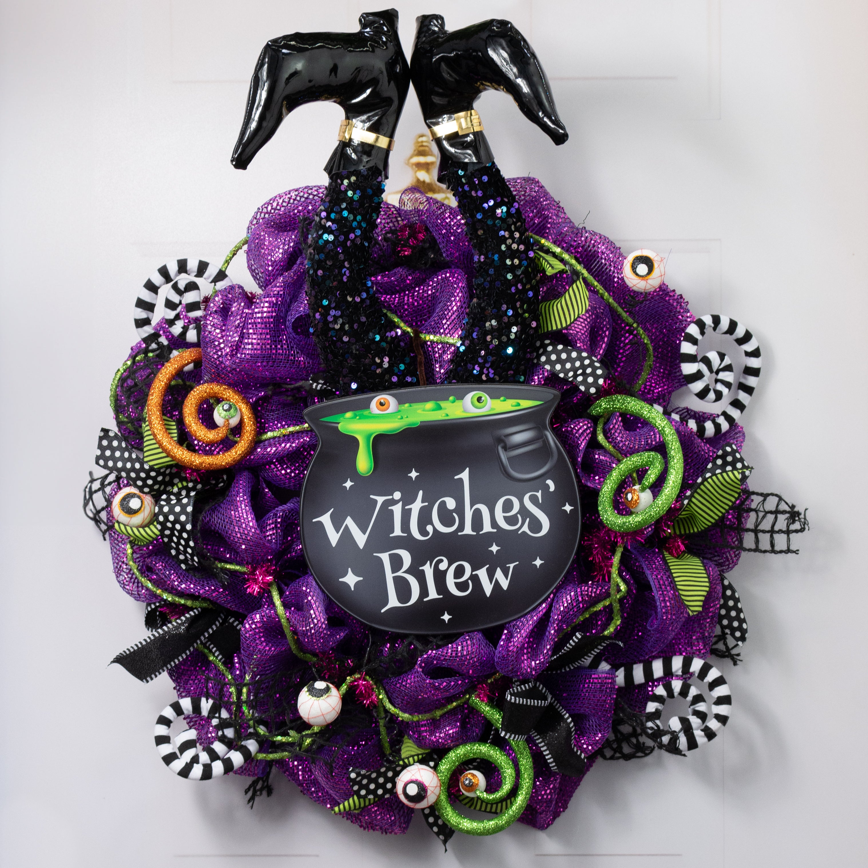 33" Jumbo Iridescent Sequin Witch Legs Spray: Black
