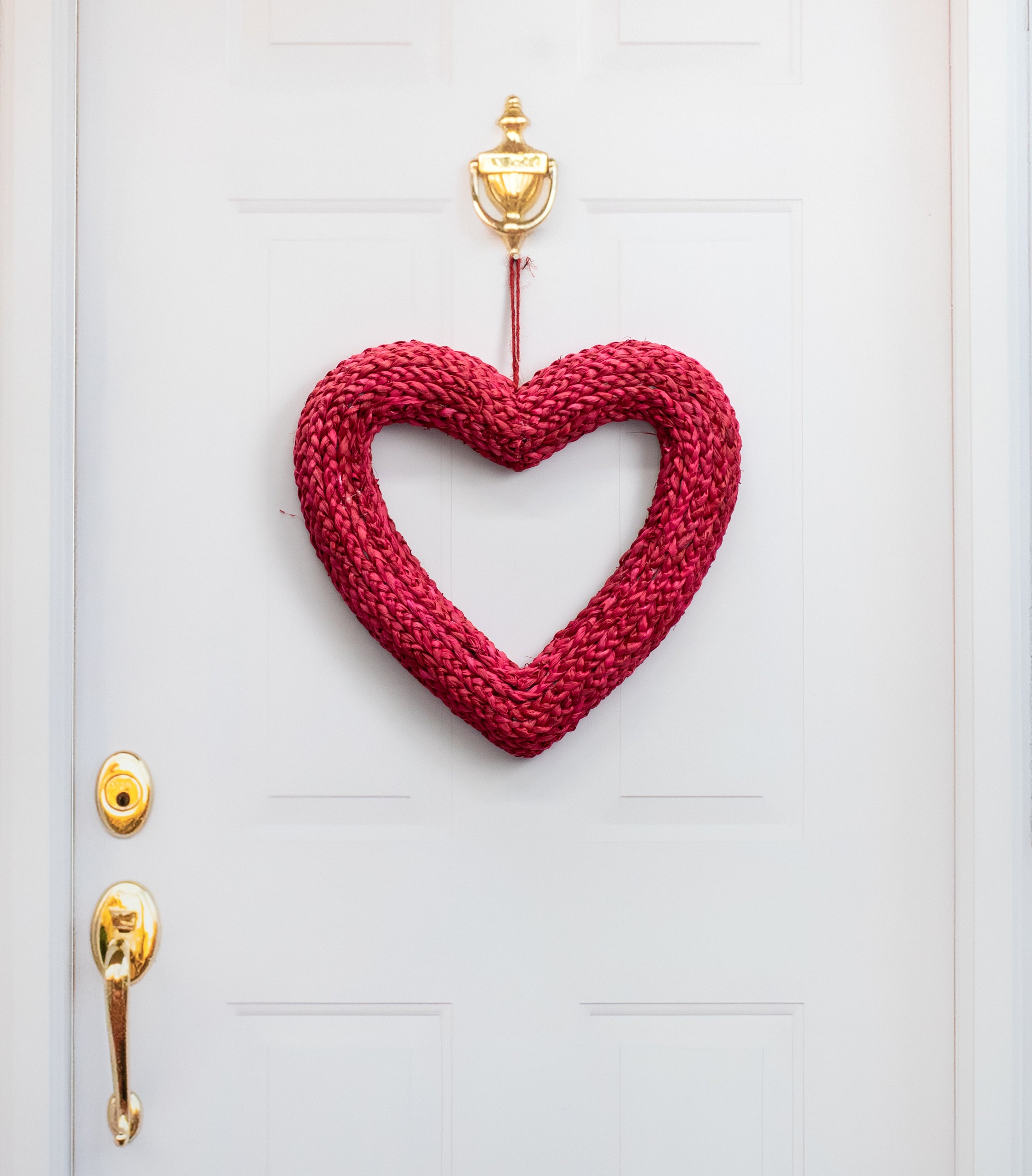 17.5" Braided Grass Heart Wreath: Red Lifestyle Photo