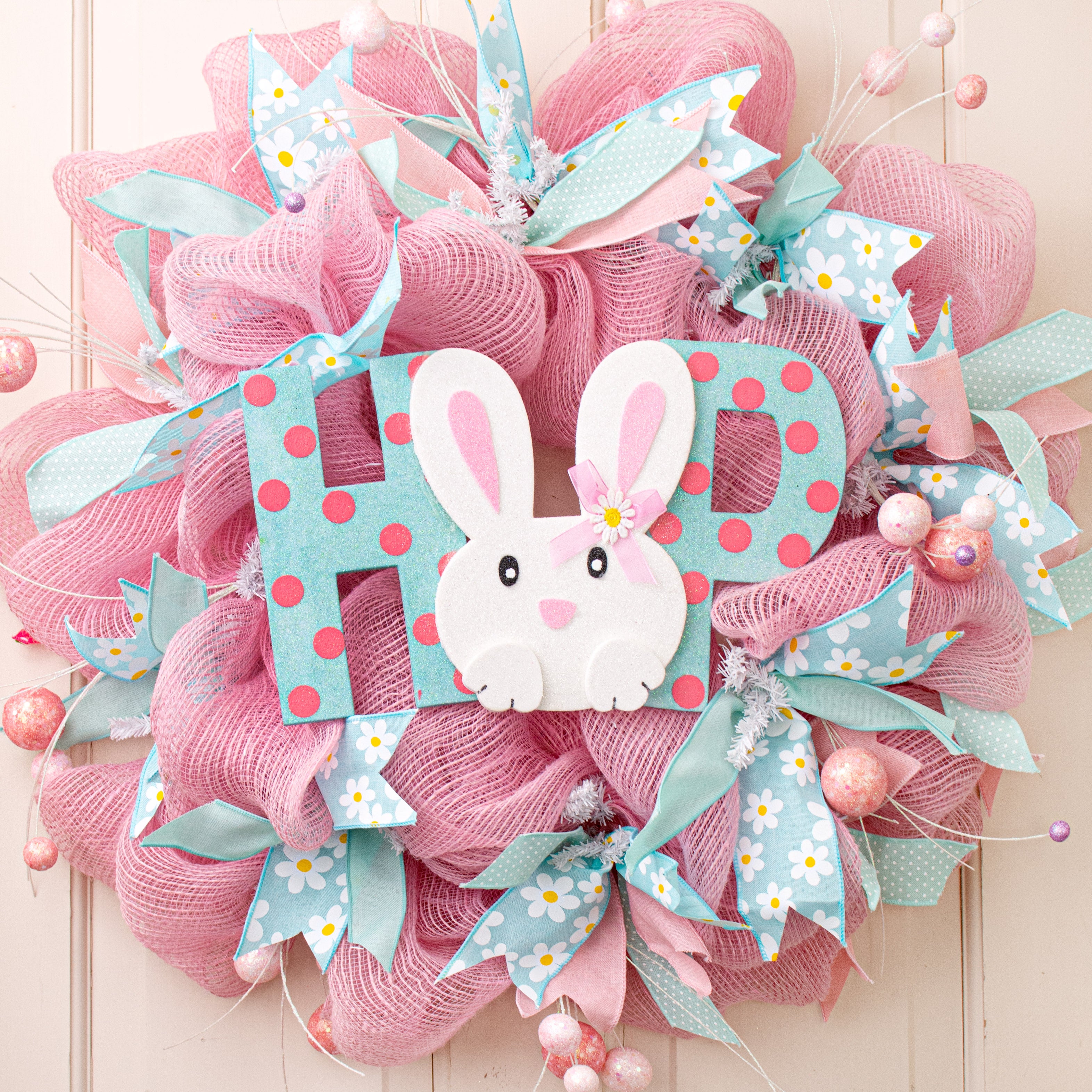 13.5" Bunny Hop Ornament: Blue & Pink Lifestyle Photo