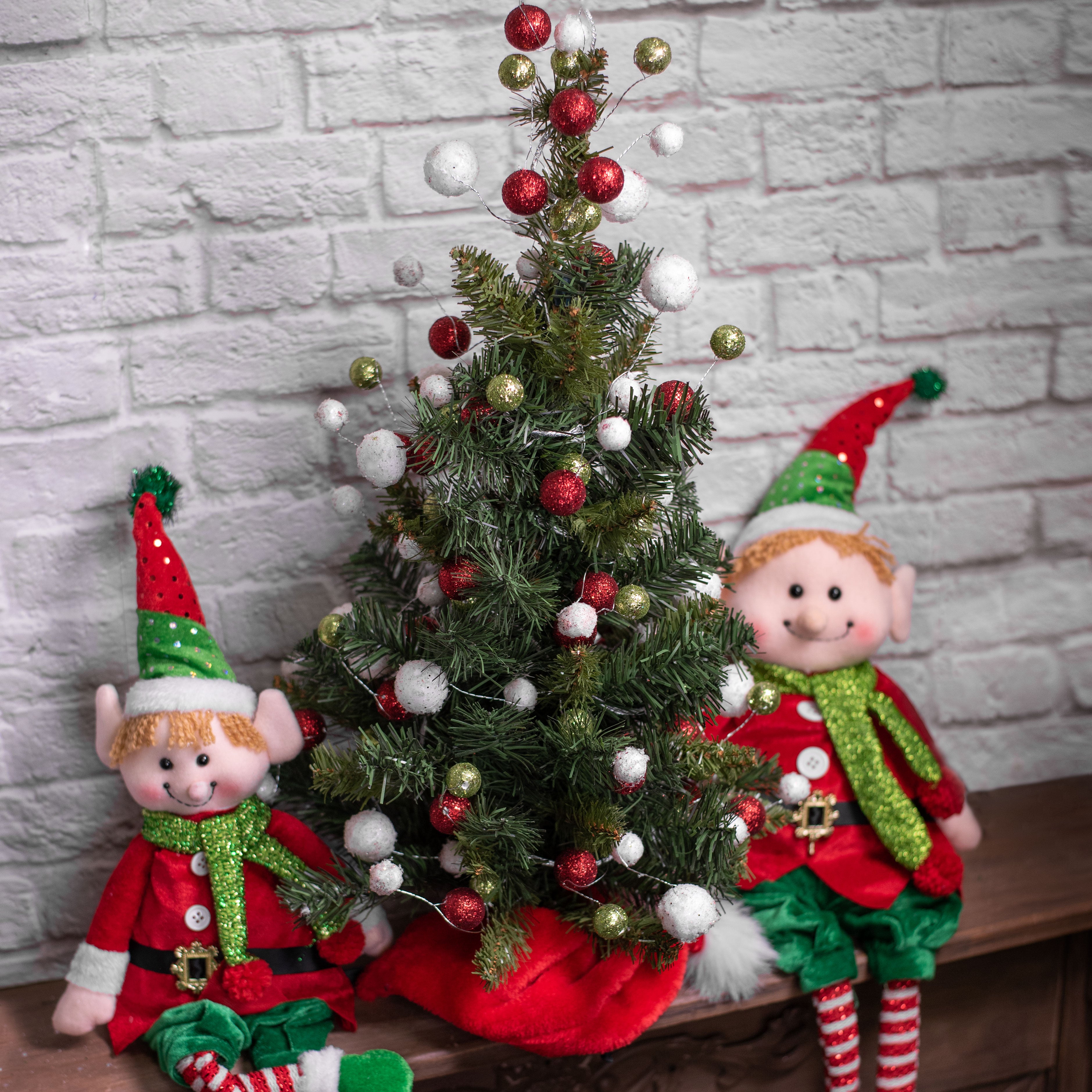24" Christmas Tree With Spike & Stand Lifestyle Photo