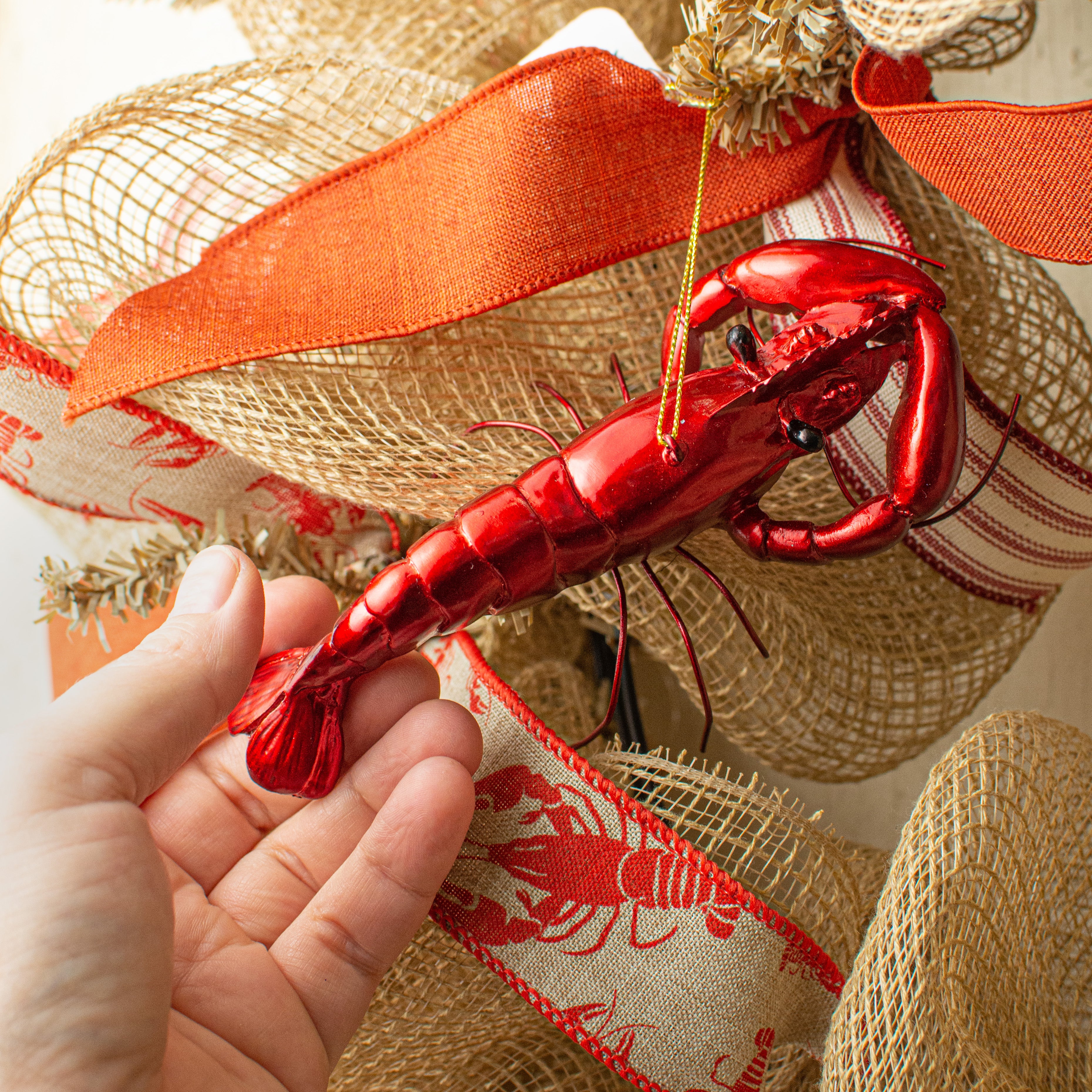 5.5" Crawfish Ornament: Metallic Red Lifestyle Photo
