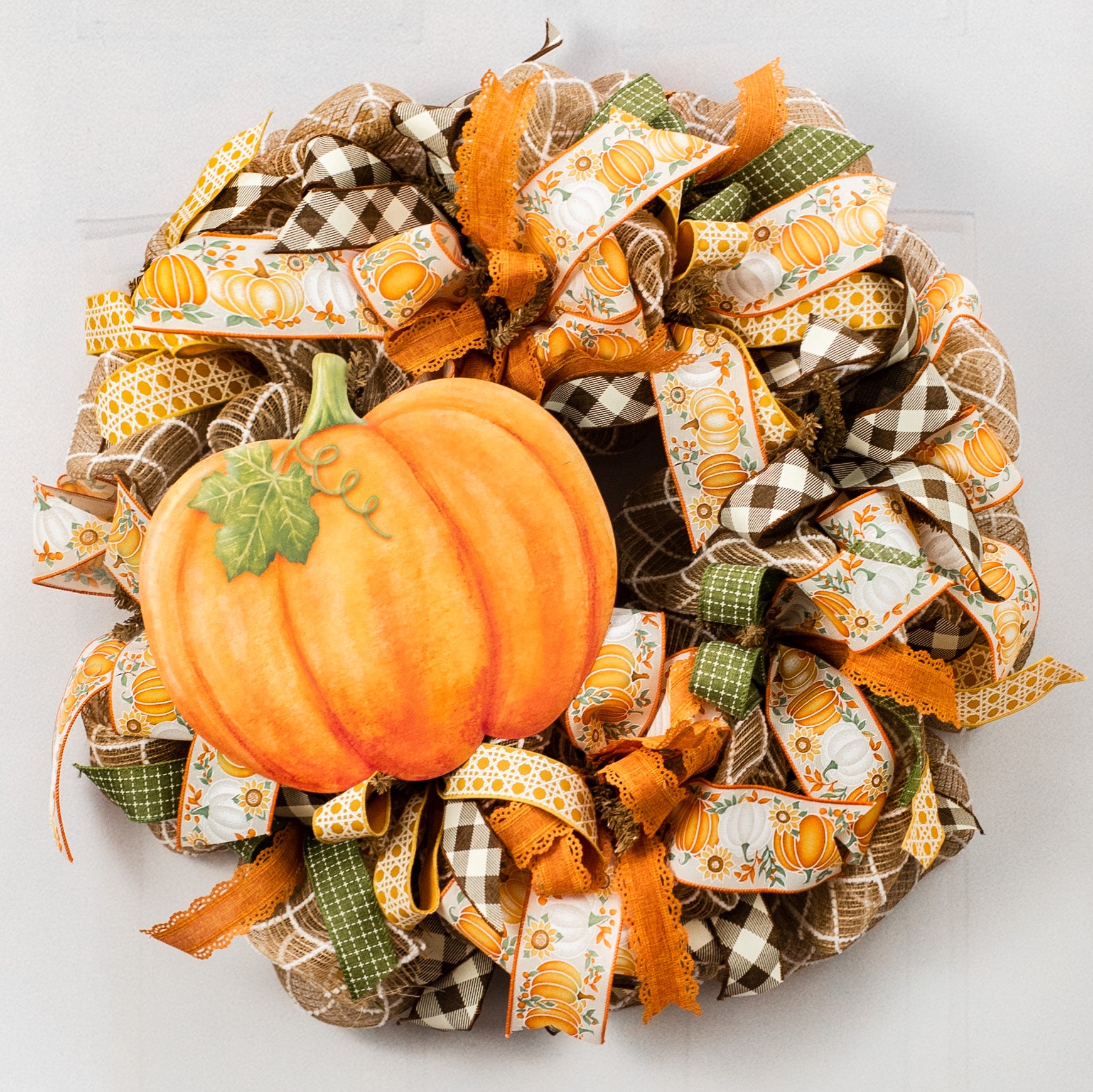 12" Embossed Metal Pumpkin Hanger: Orange Lifestyle Photo