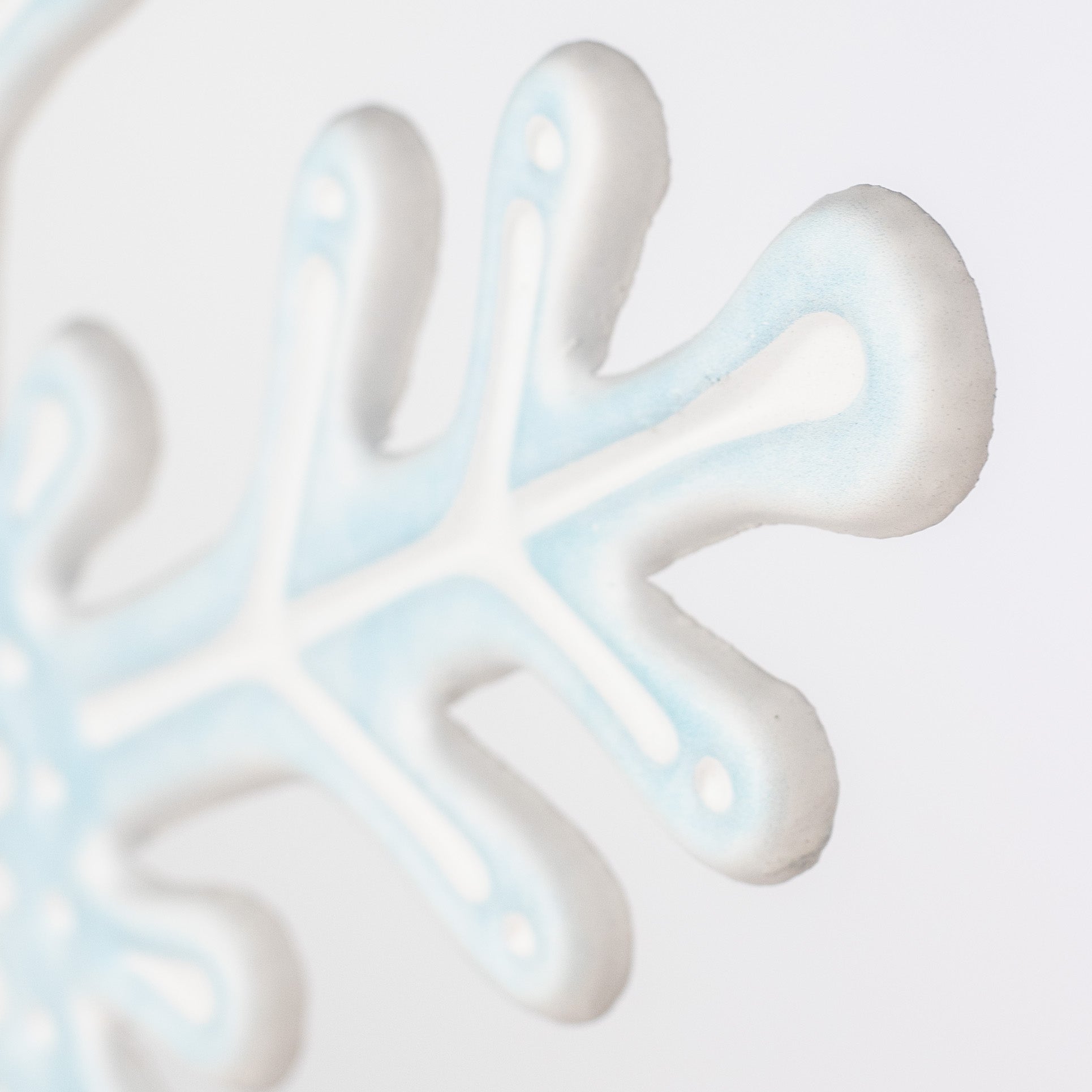 12" Embossed Metal Snowflake Hanger: Pale Blue & White detail photo 3