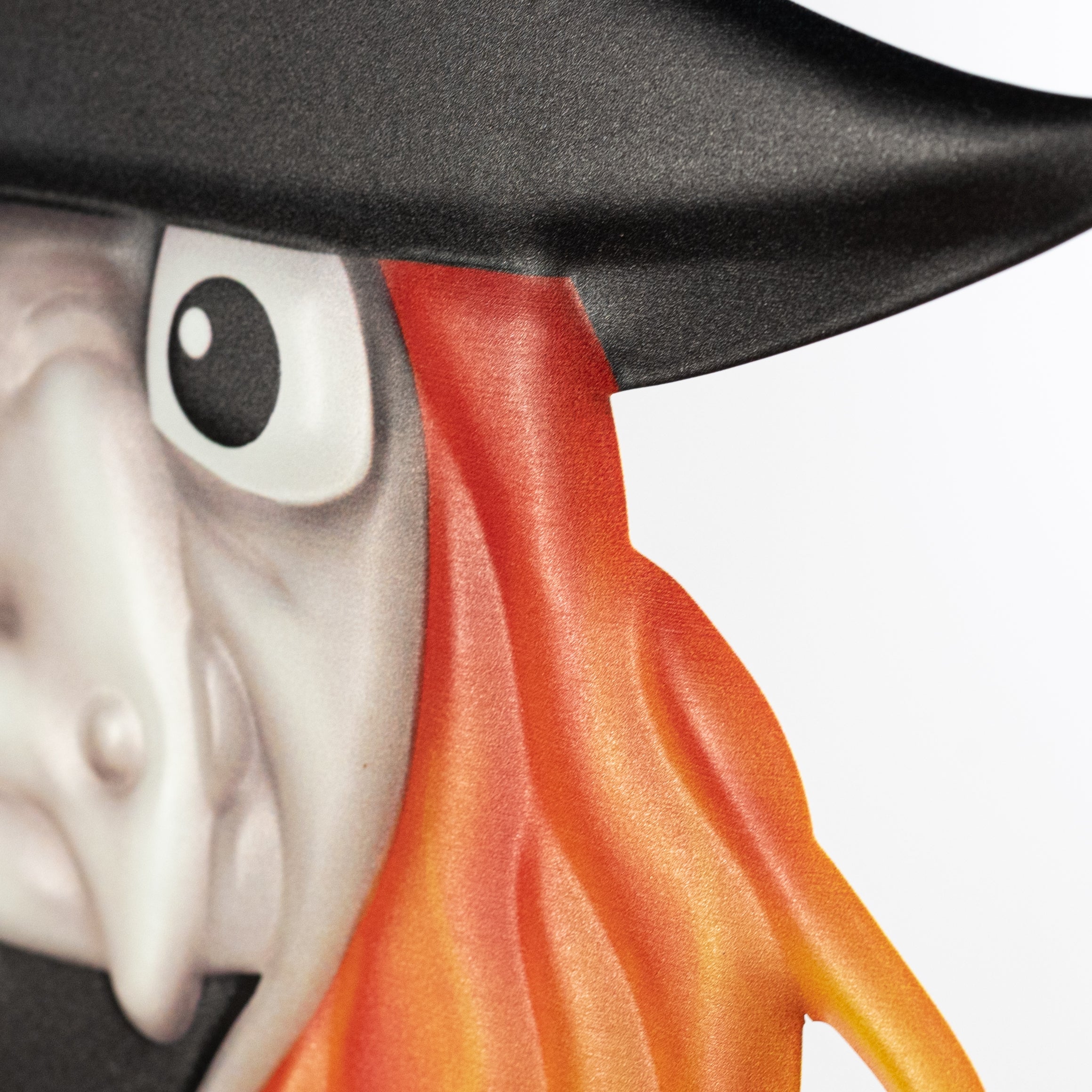 12" Embossed Metal Witch Head Decoration: Orange detail photo 3