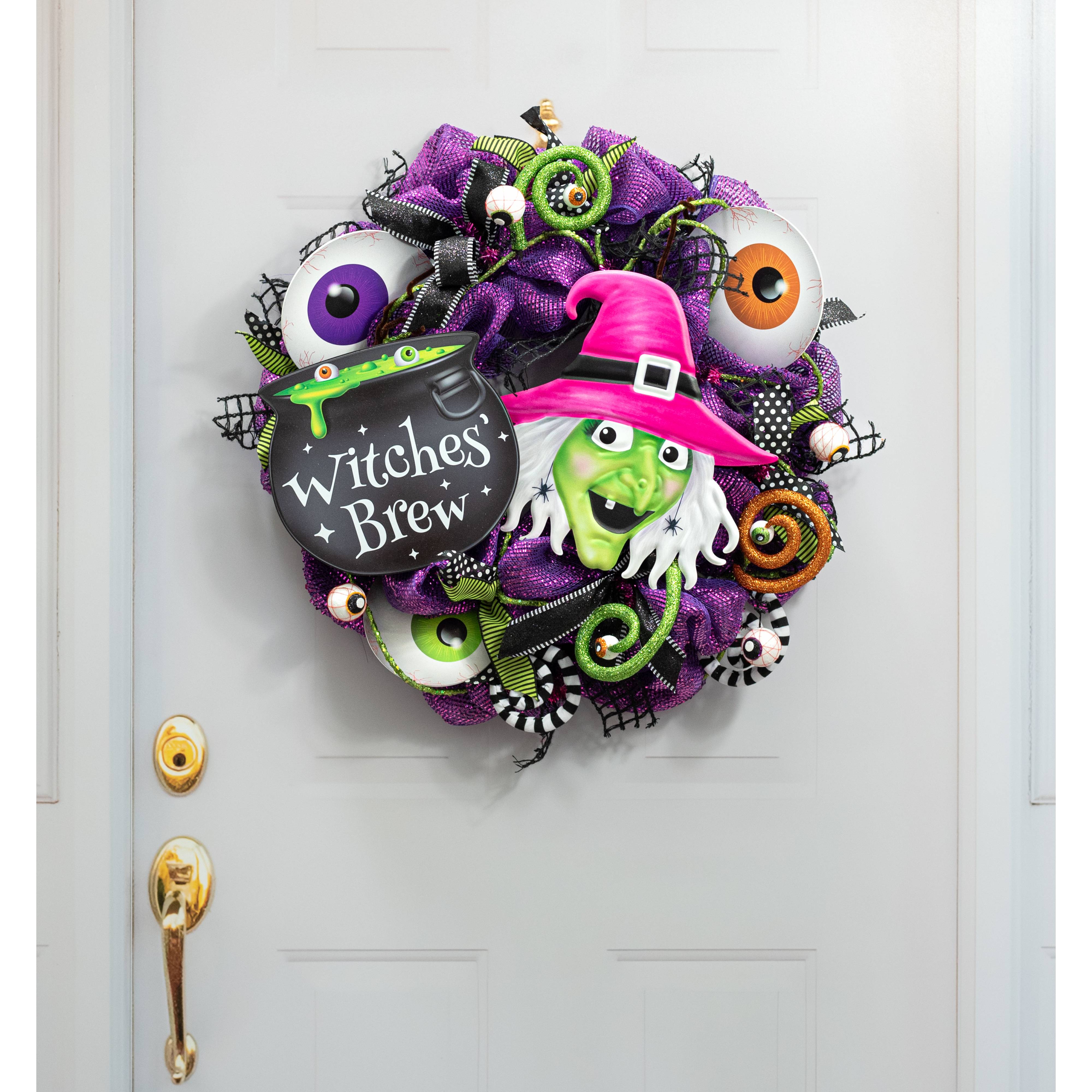 12" Embossed Metal Witch Head Decoration: Pink Lifestyle Photo