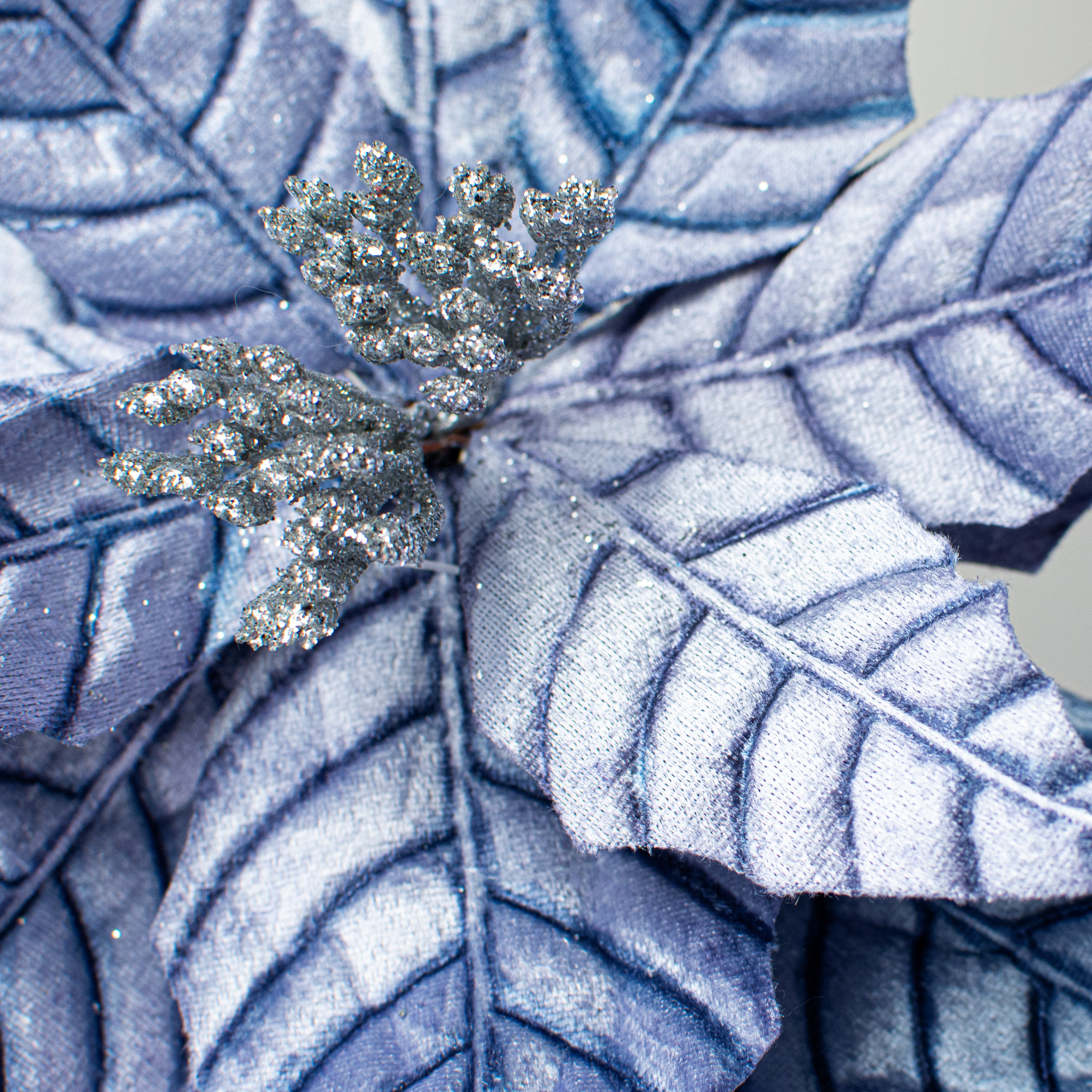 22" Embossed Poinsettia Stem: Blue Lifestyle Photo