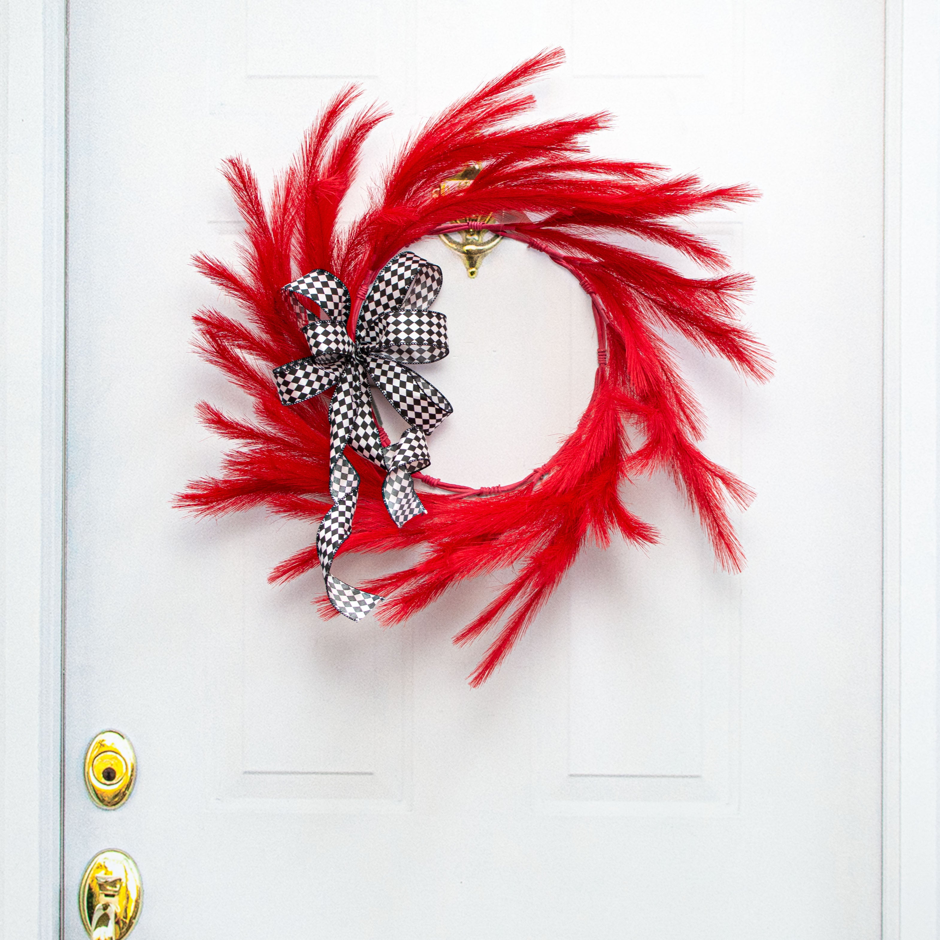 26" Fabric Pampas Grass Wreath: Red Lifestyle Photo