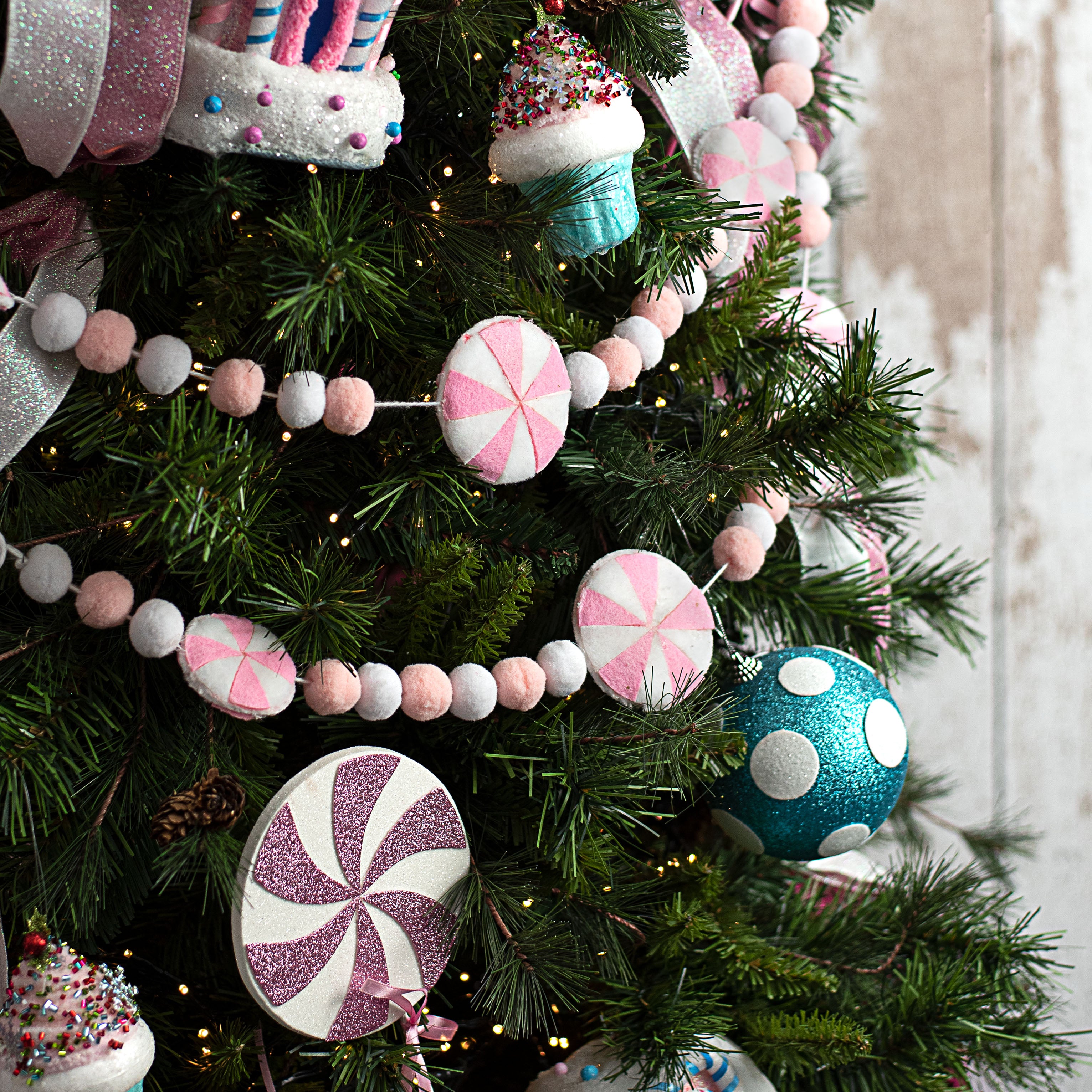 5' Felt Ball Peppermint Garland: Pink & White Lifestyle Photo