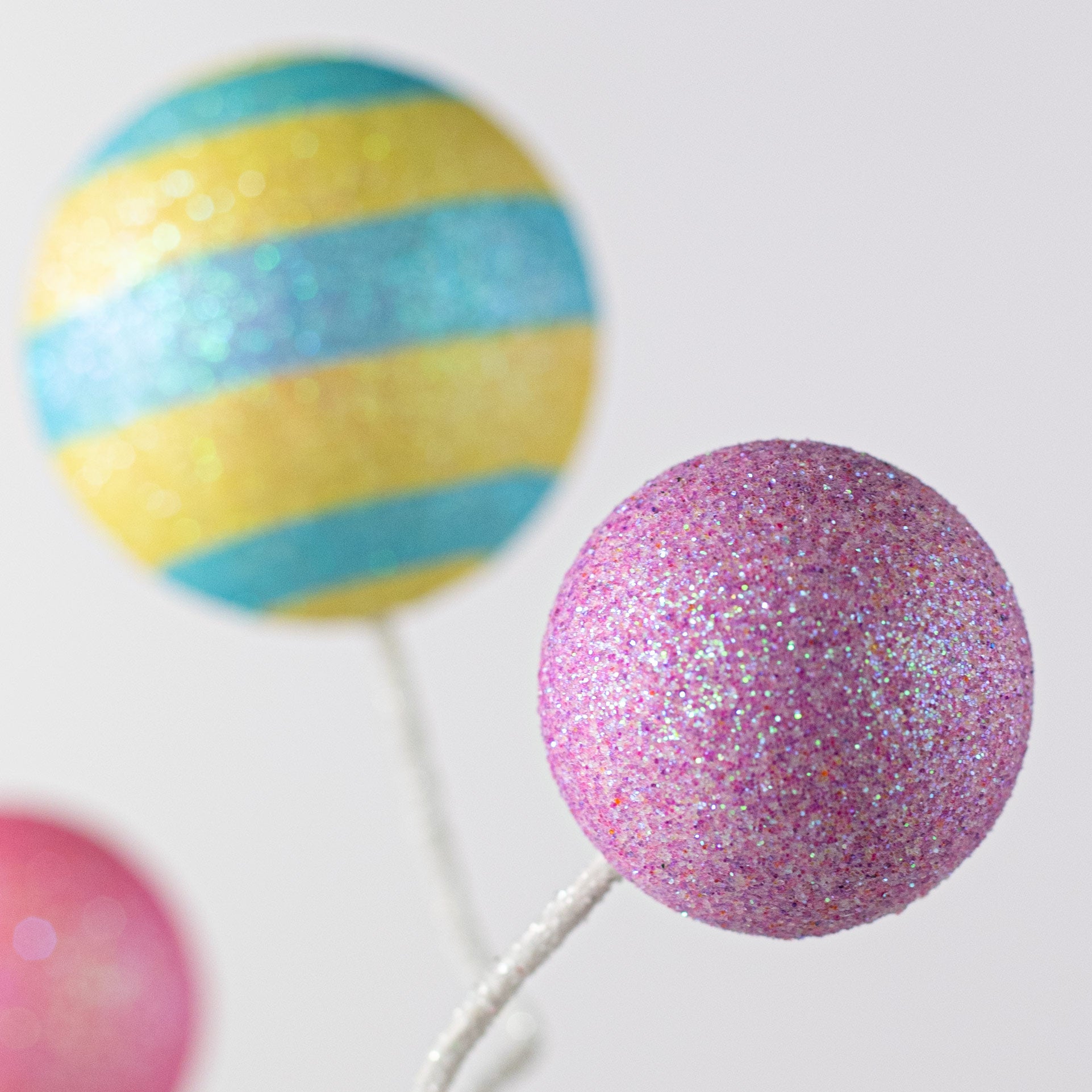 18" Glitter Ball Spray: Pink, Blue, Lavender, Yellow, Green Lifestyle Photo