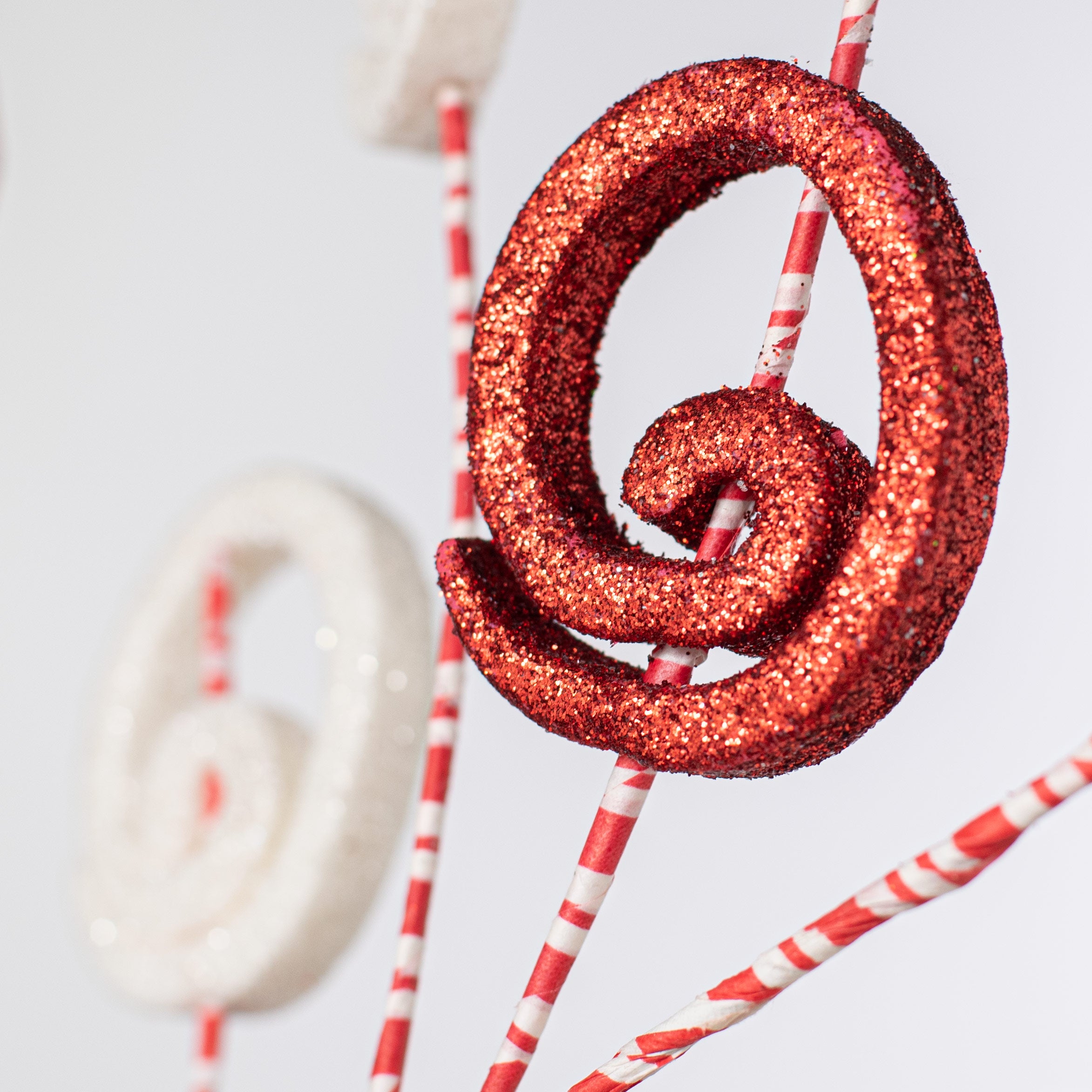 33" Glitter Disc Spray: Red & White Candy Stripe Lifestyle Photo