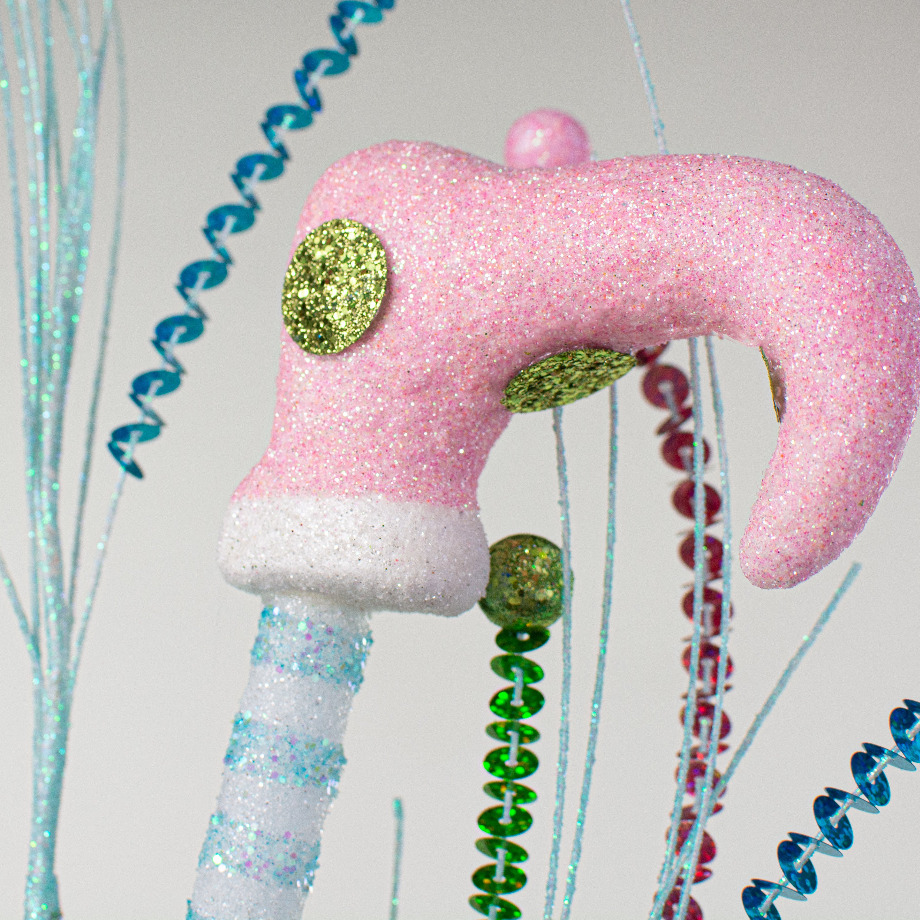 36" Glitter Elf Leg Spray: Ice Blue, Light Pink, Lime Lifestyle Photo