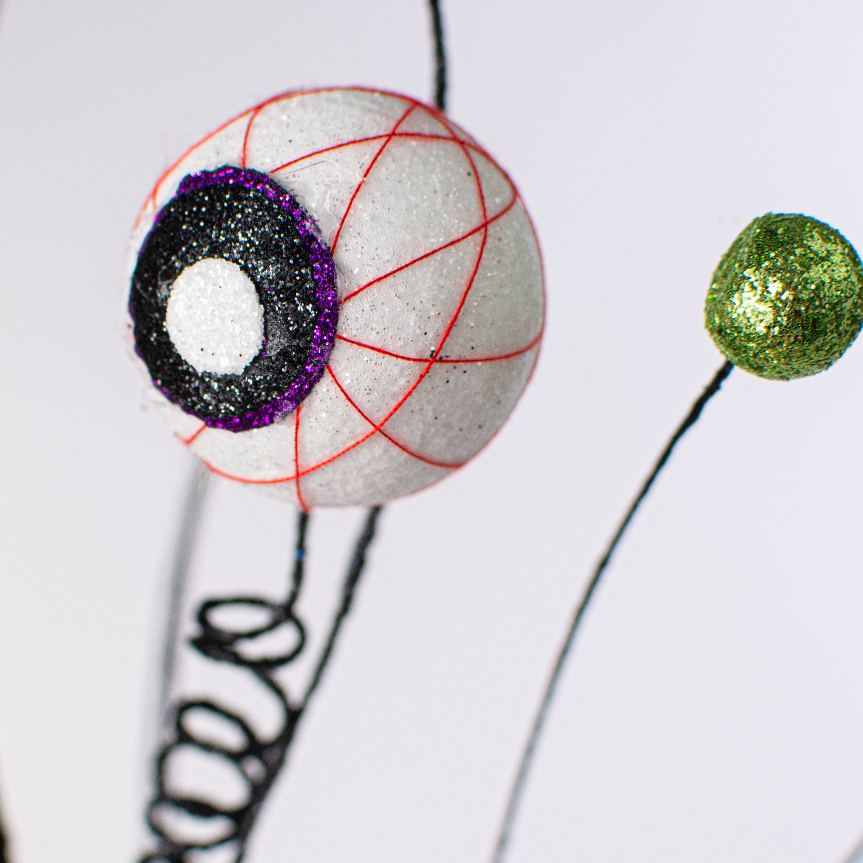29" Glitter Eyeball Spray Lifestyle Photo