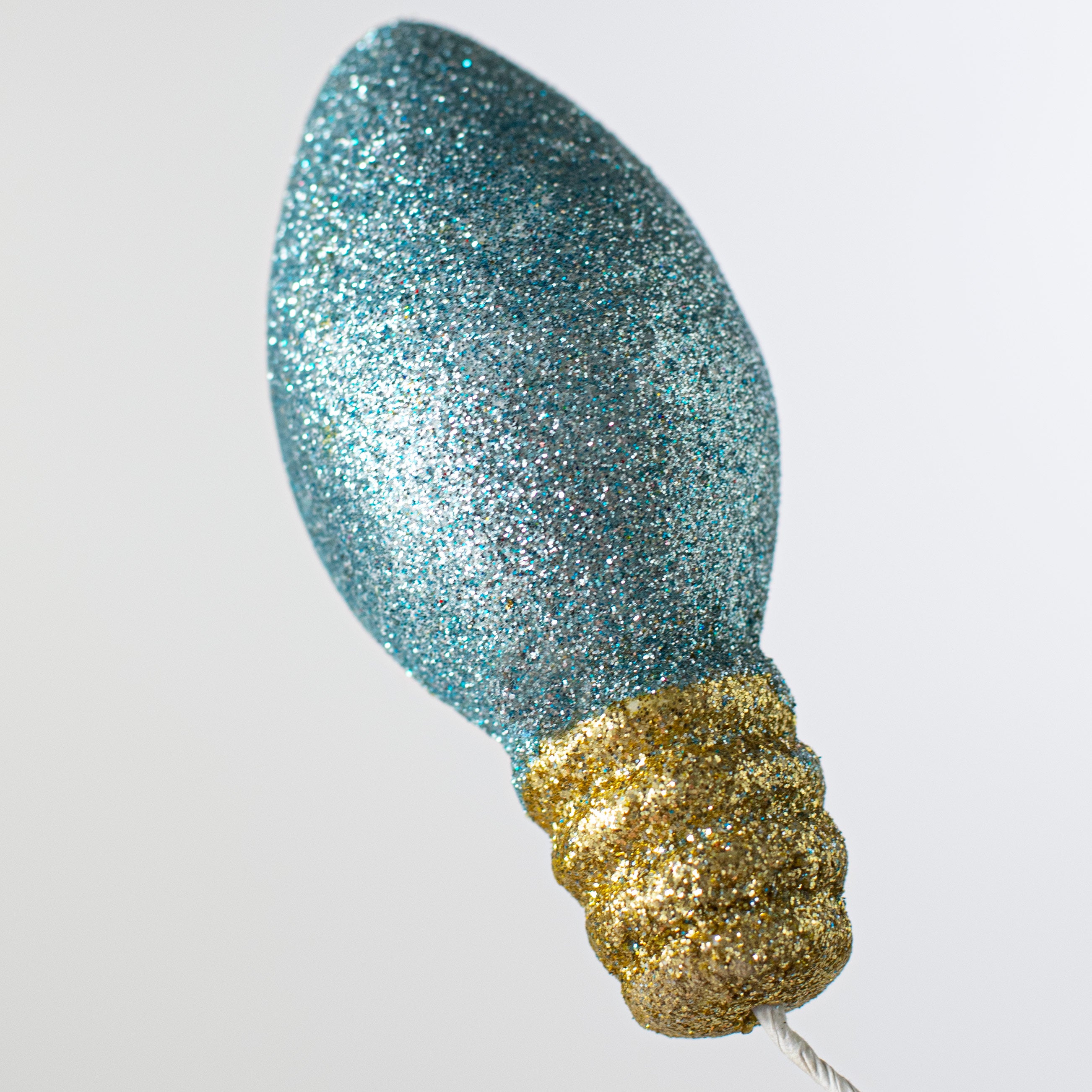 30" Glitter Light Bulb Spray: Gold & Blue Lifestyle Photo