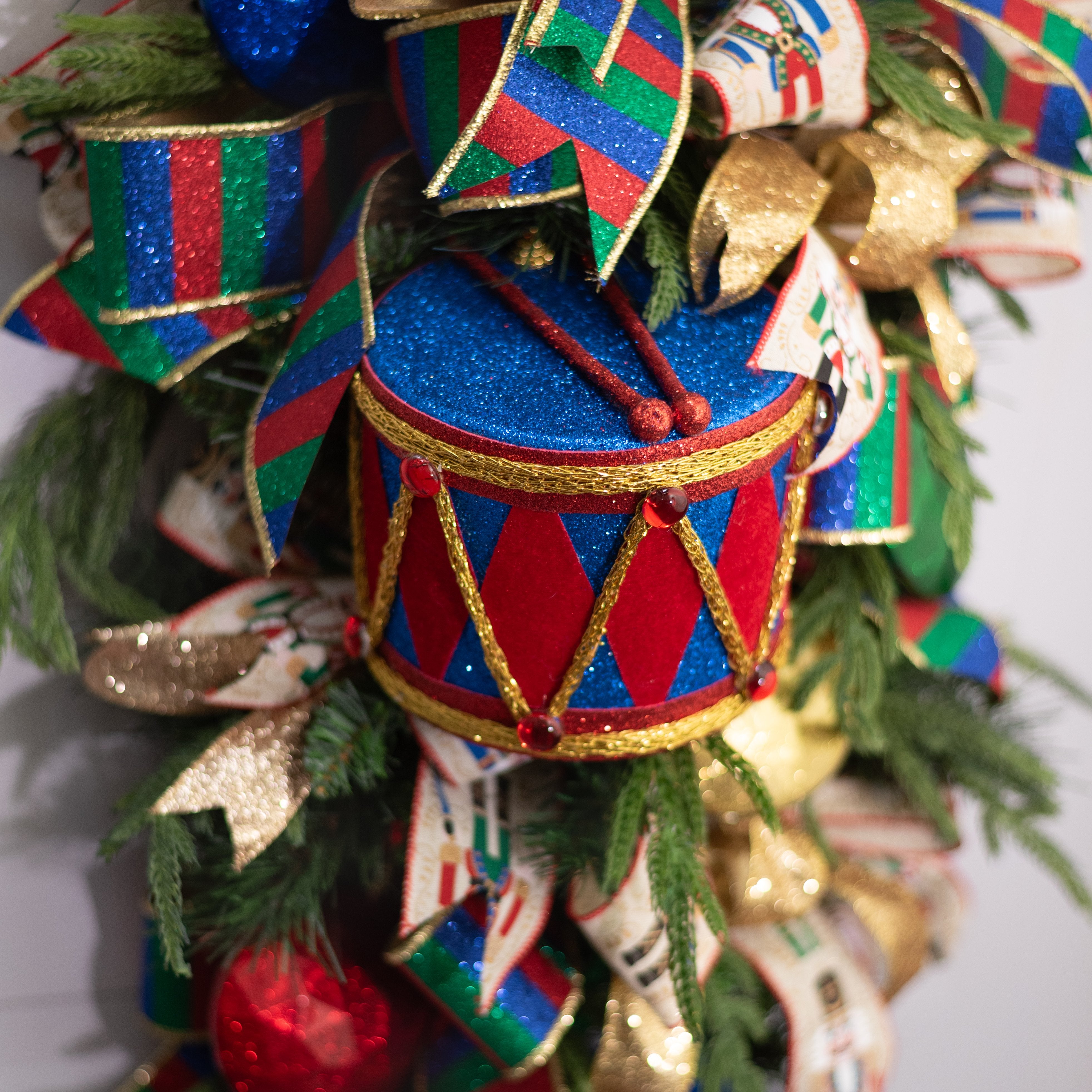 6" Glittered Harlequin Drum Ornament: Red & Blue Lifestyle Photo