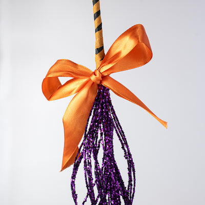 26" Glittered Twig Witch Broom: Purple Lifestyle Photo