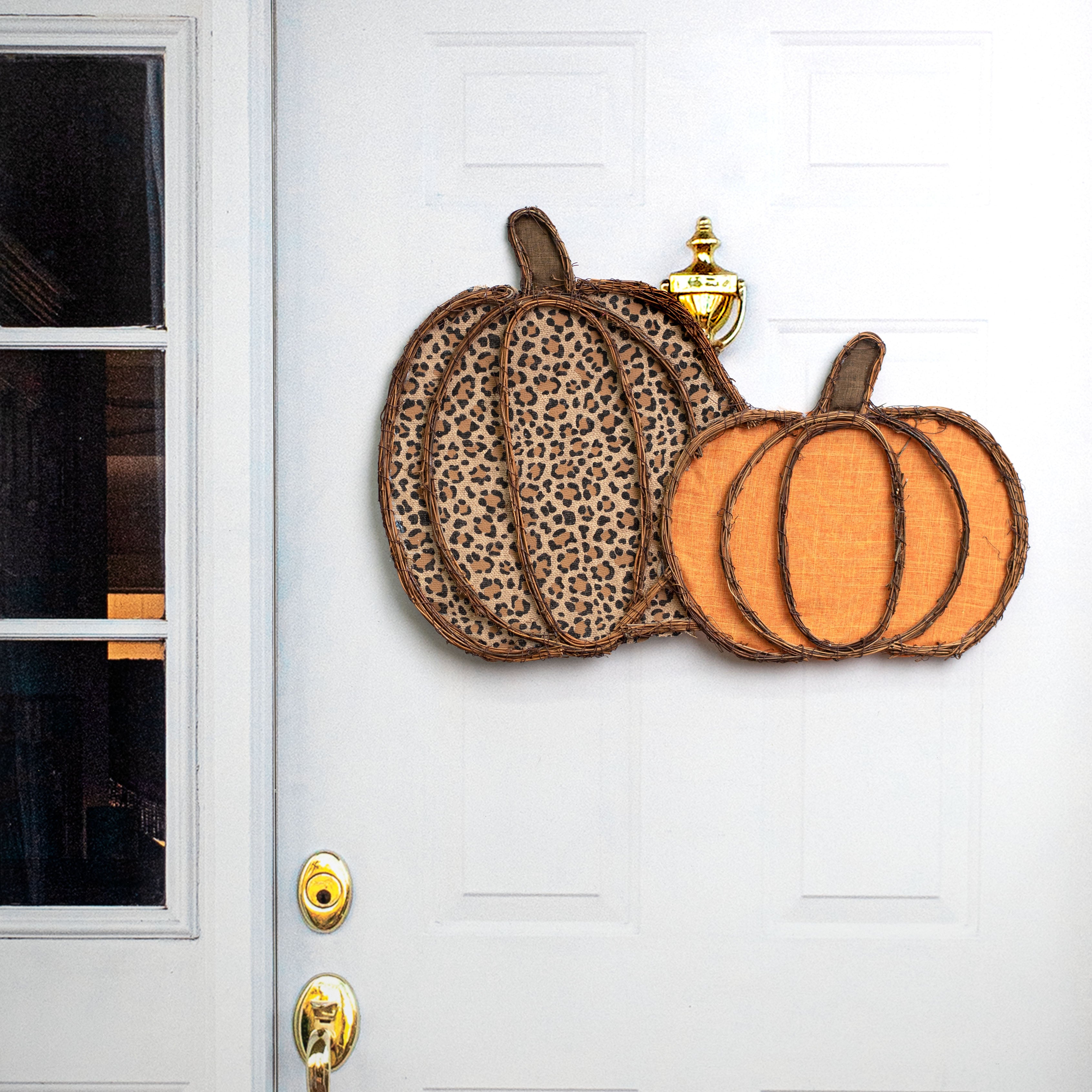 26" Grapevine Hanger: Leopard & Pumpkin Orange Pumpkins Lifestyle Photo
