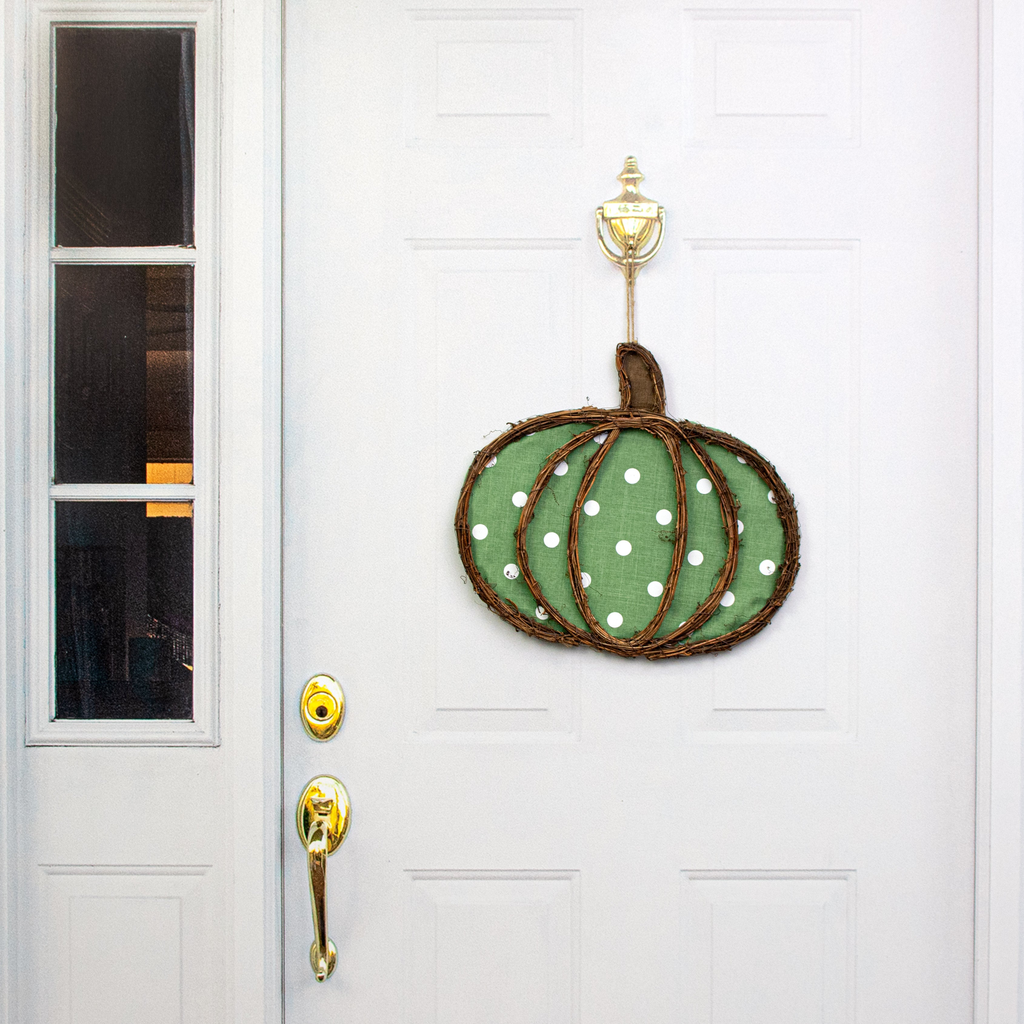 17" Grapevine Hanger: Sage Green Pumpkin Lifestyle Photo