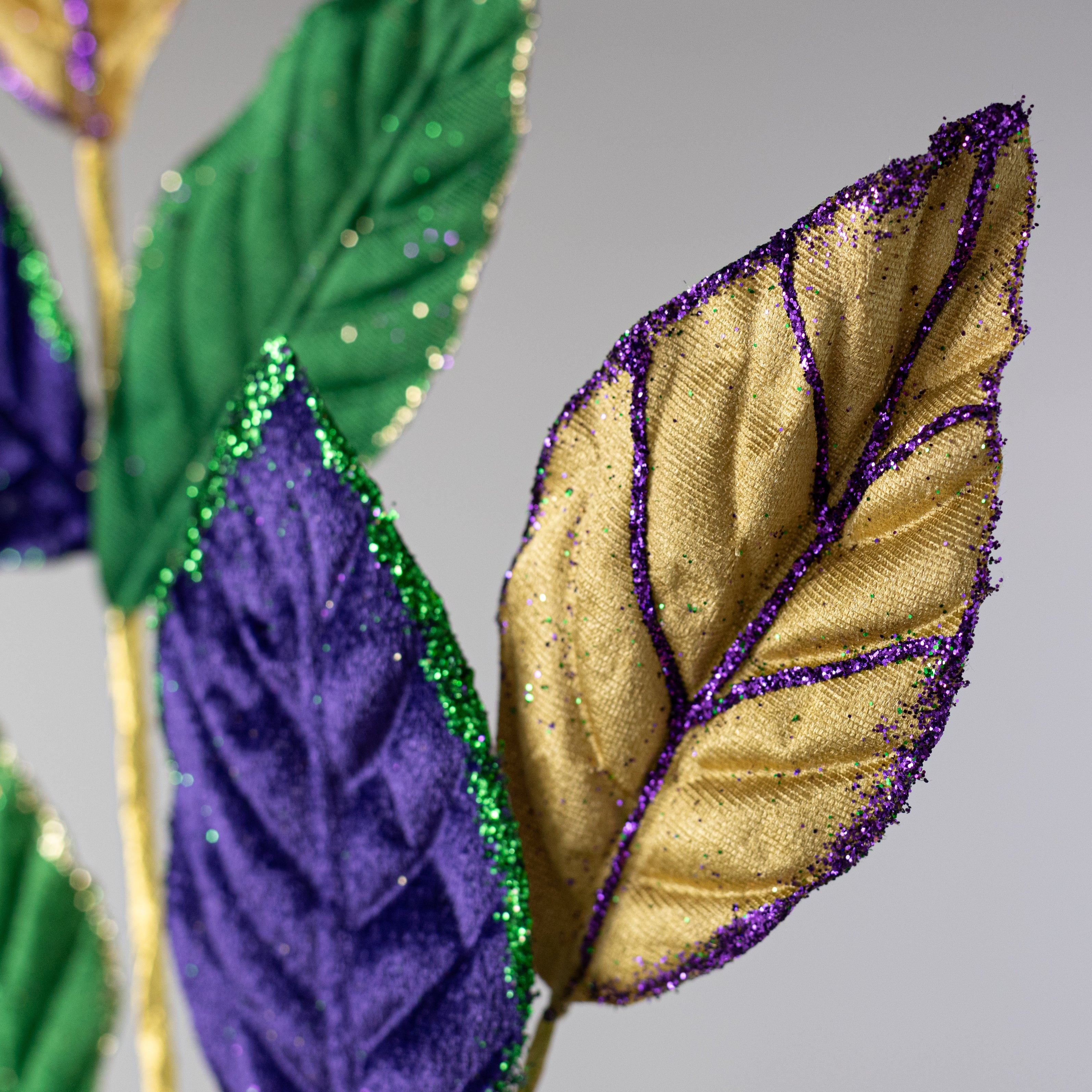 27" Glittered Velvet Leaf Spray: Mardi Gras
