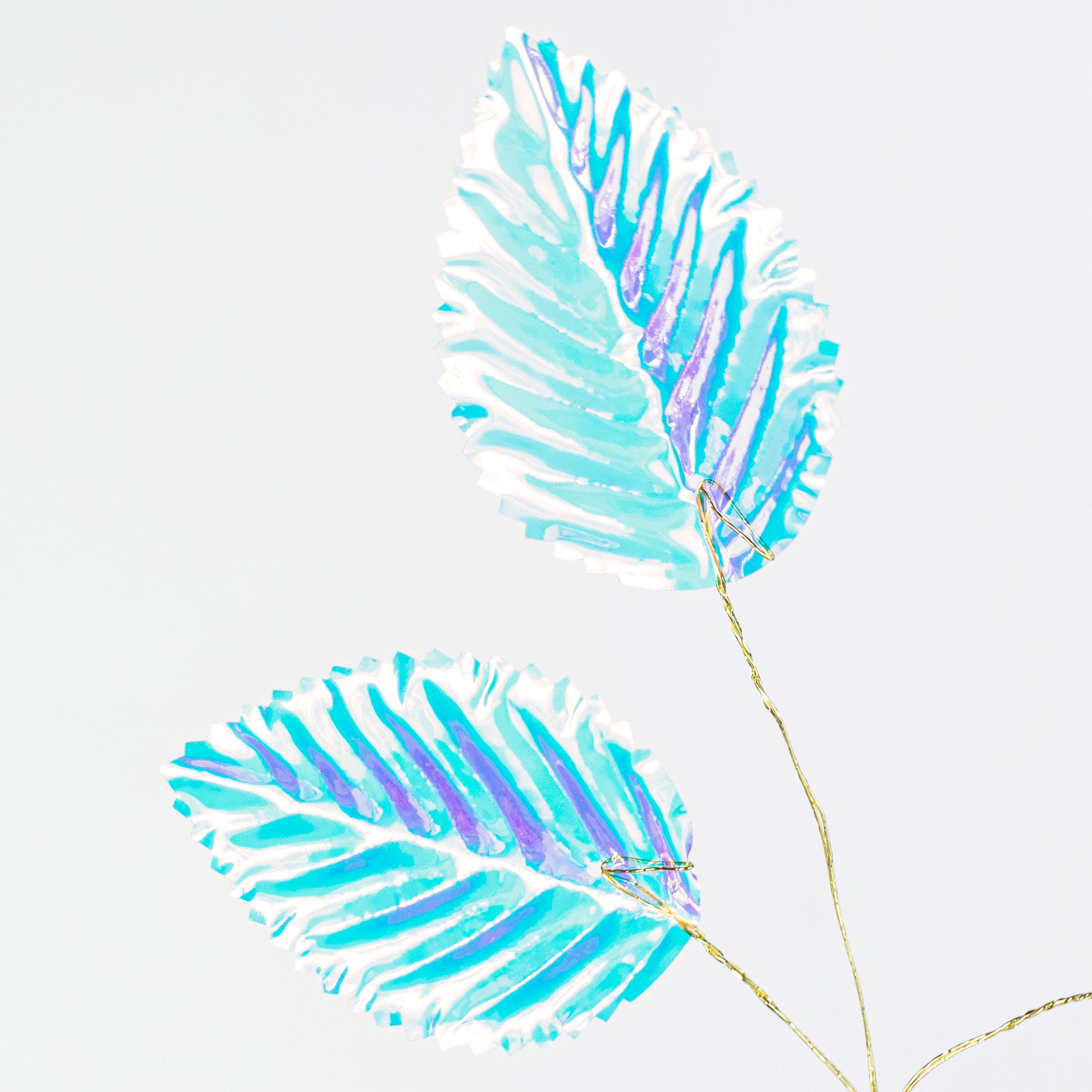 28" Plastic Hydrangea Leaves Spray: Iridescent Clear