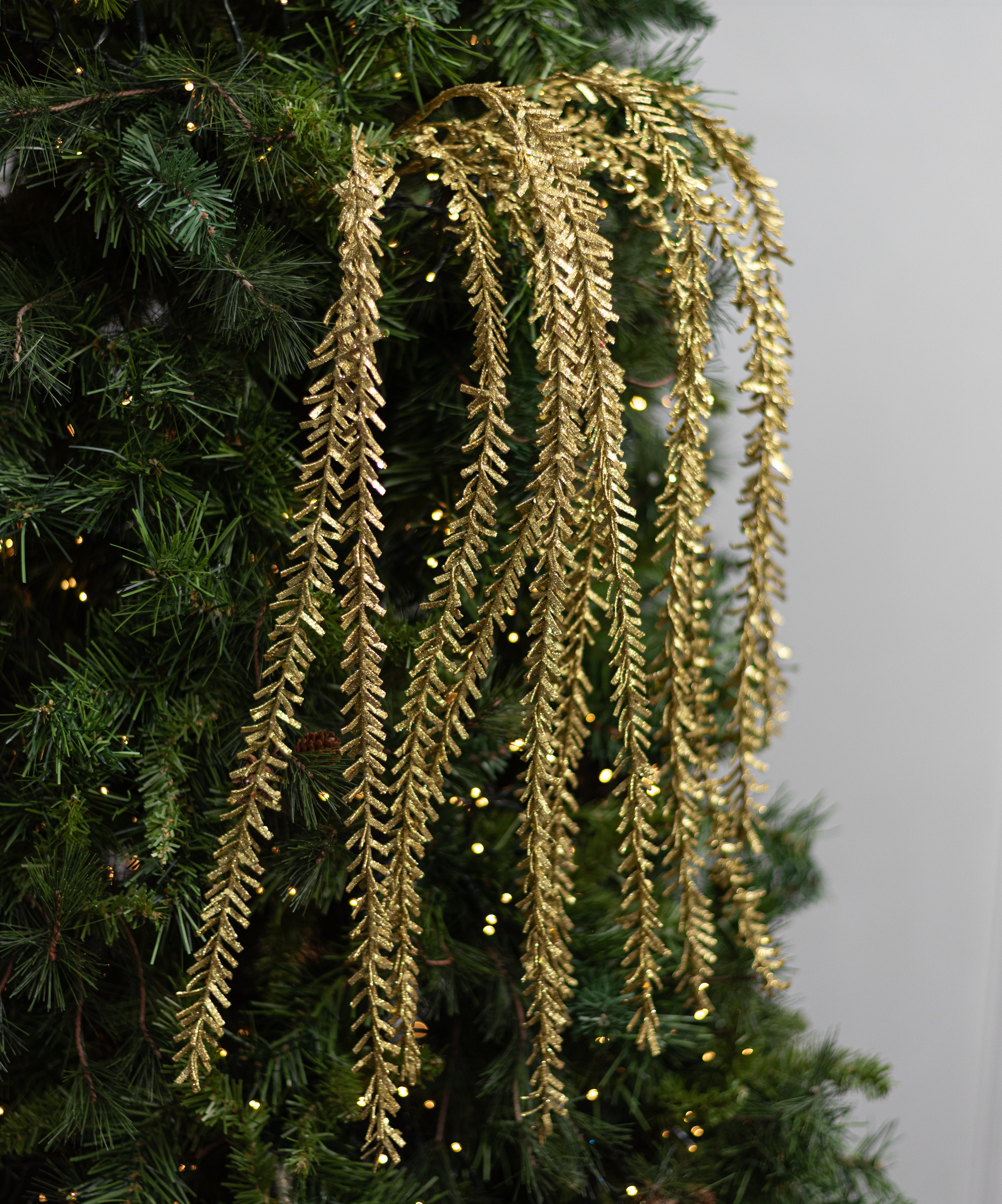 48" Glittered Pine Hanging Spray: Gold