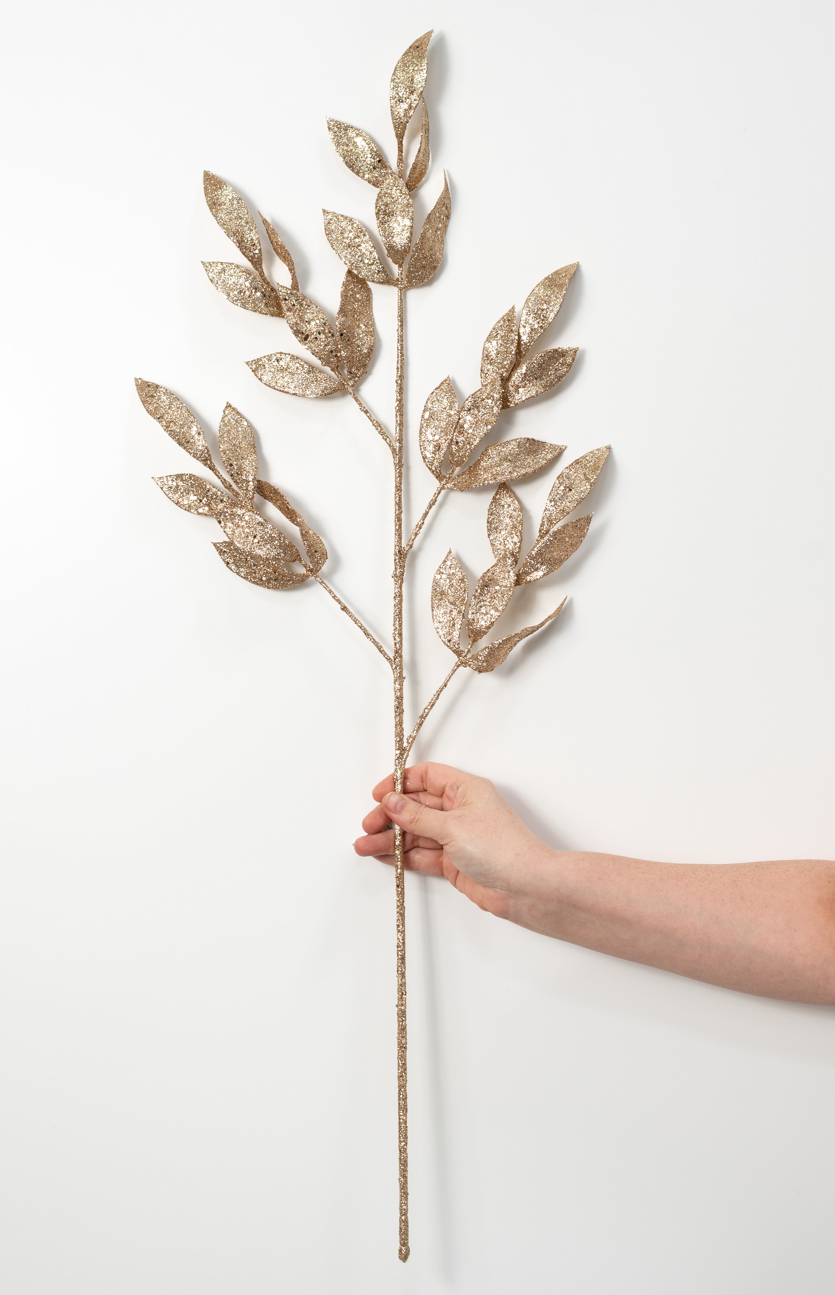 34" Glittered Laurel Leaves Branch: Champagne Gold