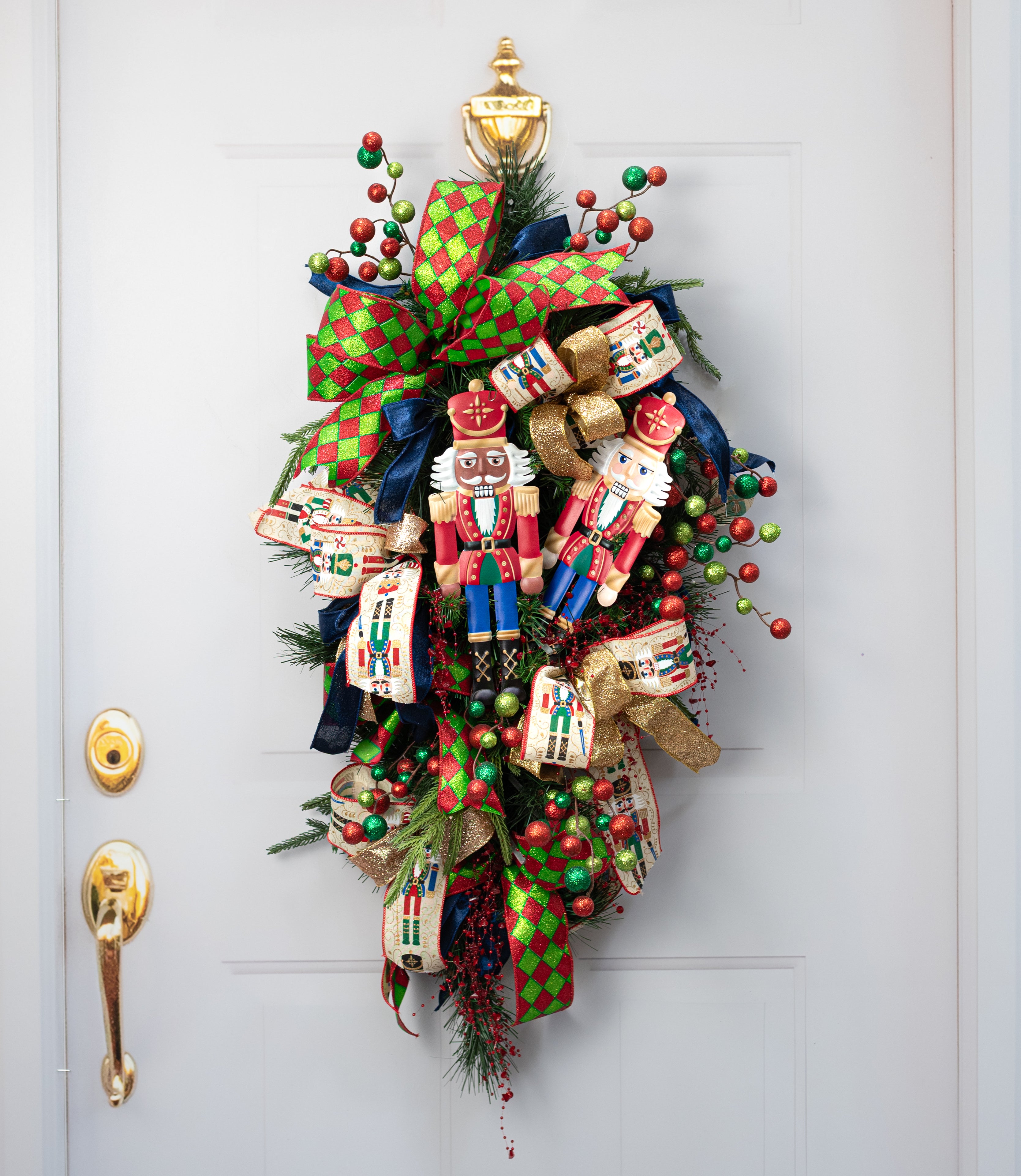 12" Metal Embossed Hanger: Light Traditional Nutcracker